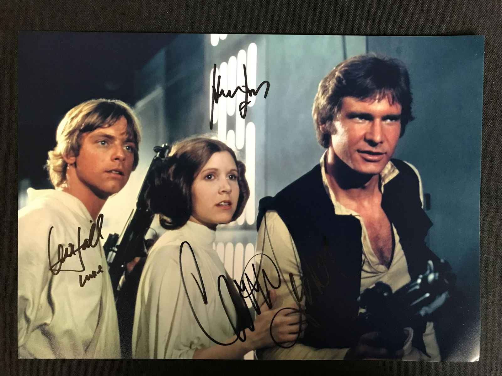 MARK HAMILL, CARRIE FISHER AND HARRISON FORD SIGNED STAR WARS 8 X 10 (RA COA) (1 of 2)