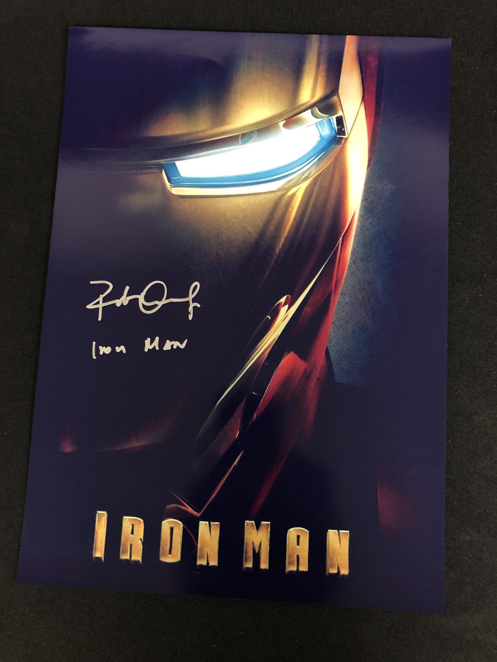 ROBERT DOWNEY JR. SIGNED IRON MAN 8 X 10 (RA COA): ROBERT DOWNEY JR. SIGNED IRON MAN 8 X 10 (RA COA)