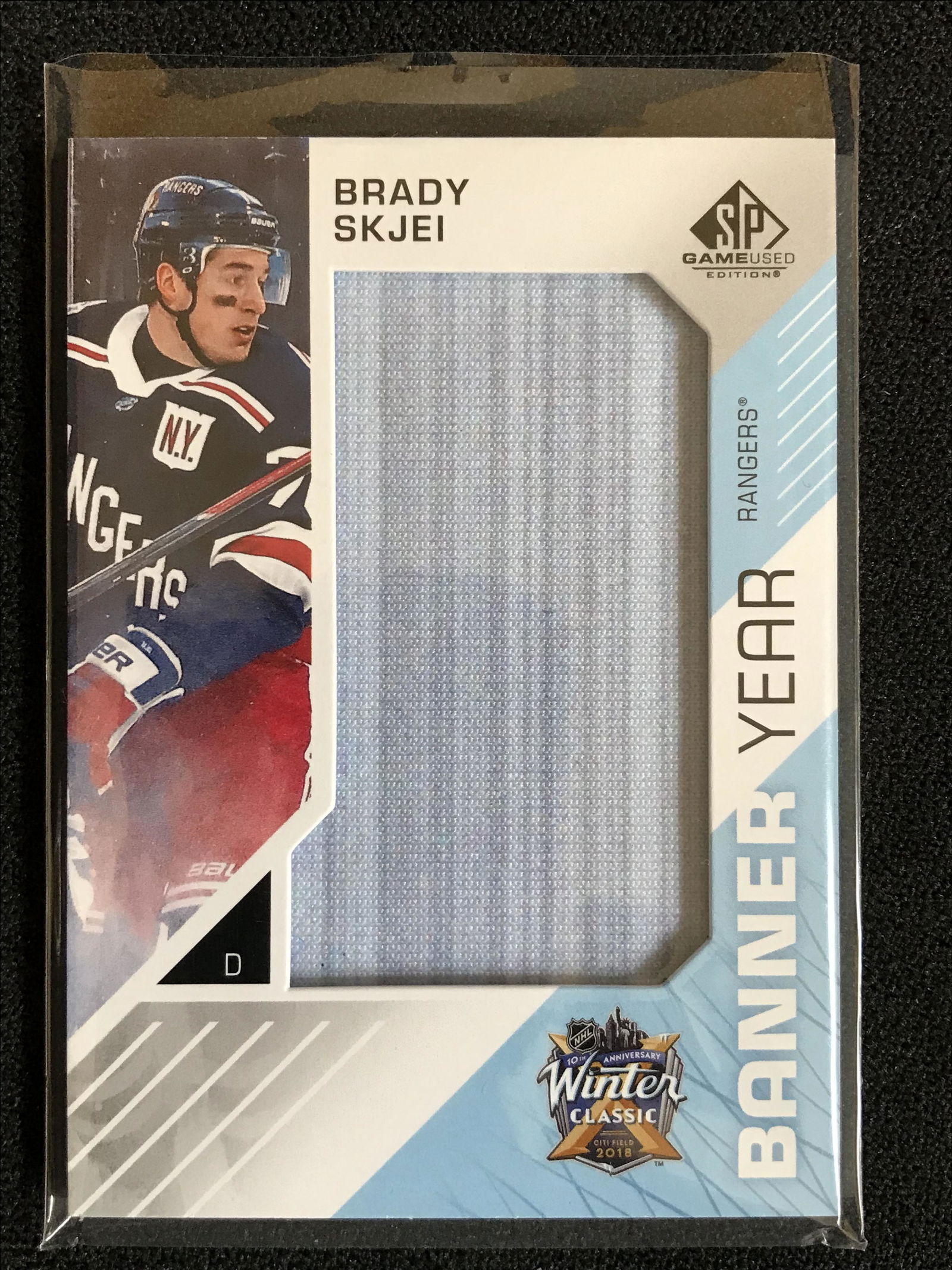 Brady Skjei 2018-19 SP Game Used Banner Year 2018 Winter Classic Rangers #BWC-BS (1 of 1)