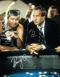 CHEVY CHASE AND RANDY QUAID DUAL-SIGNED 8X10 PHOTO (BECKETT COA): CHEVY CHASE AND RANDY QUAID DUAL-SIGNED 8X10 PHOTO (BECKETT COA)