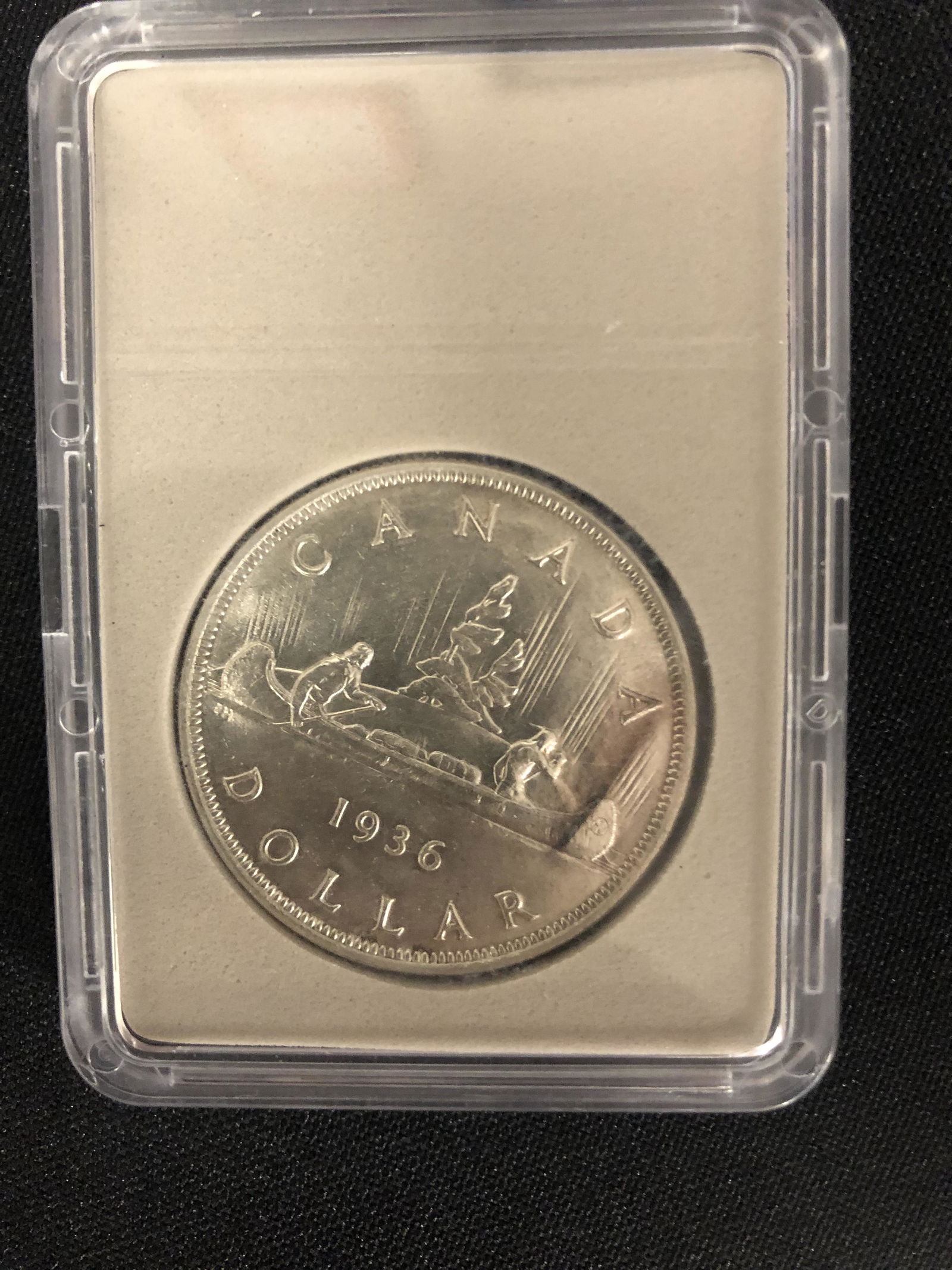 1936 CANADIAN SILVER DOLLAR (BRILLIANT UNCIRCULATED) (1 of 2)