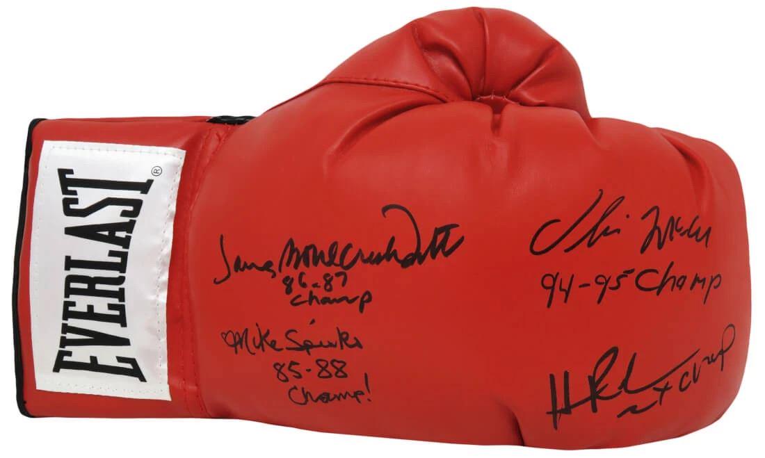 (4) FORMER BOXING HEAVYWEIGHT CHAMPIONS MULTI SIGNED EVERLAST BOXING GLOVE W/CHAMP INSCRIPTIONS (1 of 1)