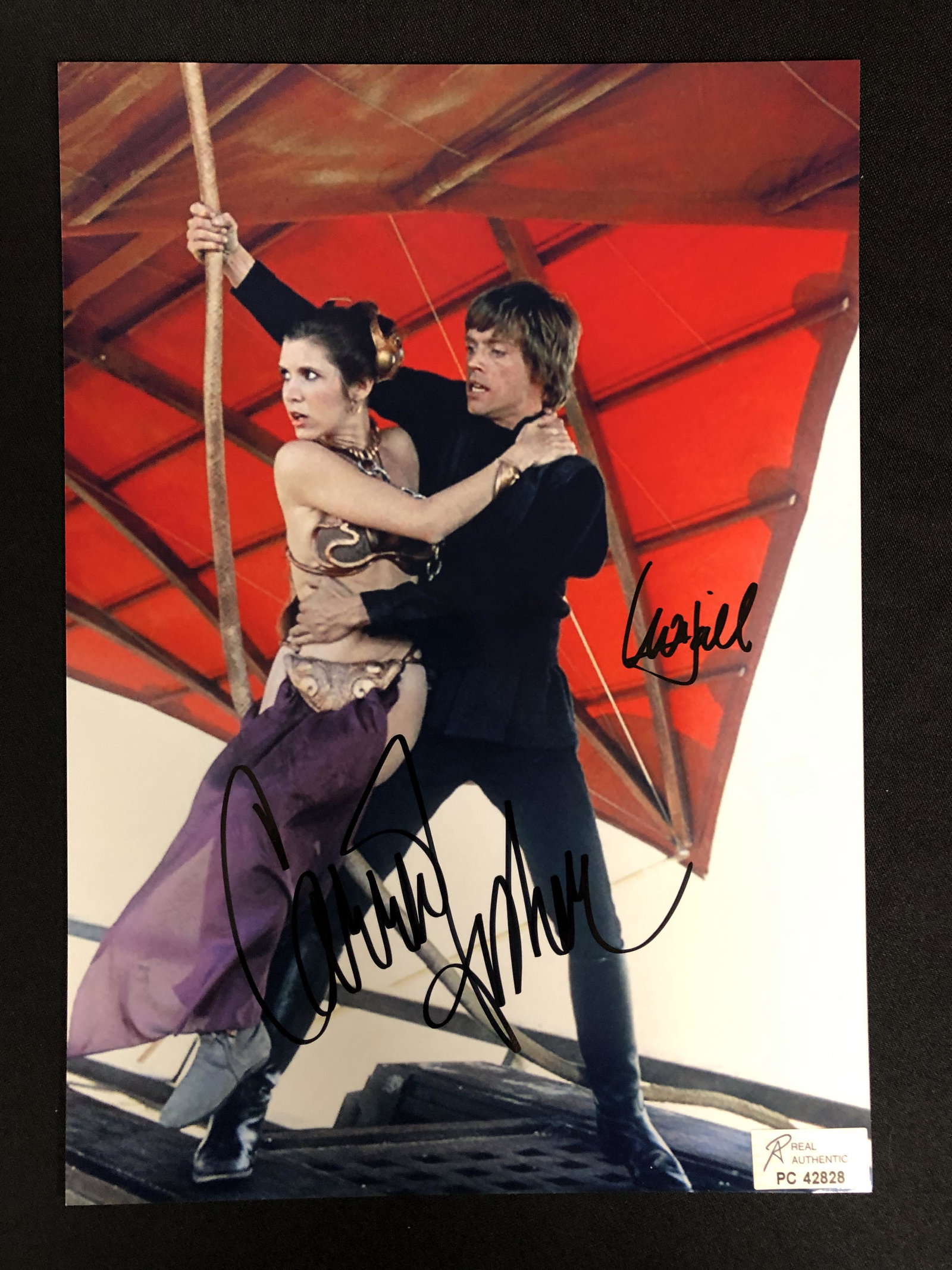 CARRIE FISHER AND MARK HAMIL SIGNED 8 X 10 (RA COA): CARRIE FISHER AND MARK HAMIL SIGNED 8 X 10 (RA COA)
