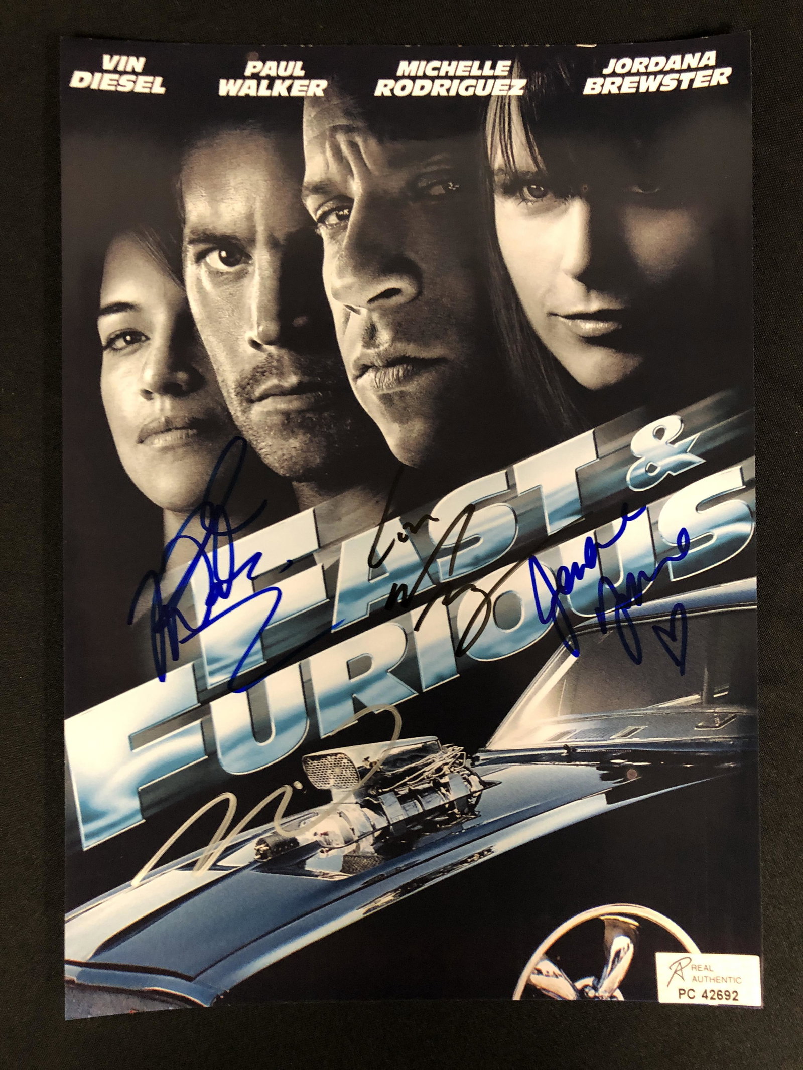 FAST AND THE FURIOUS CAST SIGNED 8 X 10 (DIESEL, RODRIGUEZ,BREWSTER) RA COA: FAST AND THE FURIOUS CAST SIGNED 8 X 10 (DIESEL, RODRIGUEZ,BREWSTER) RA COA