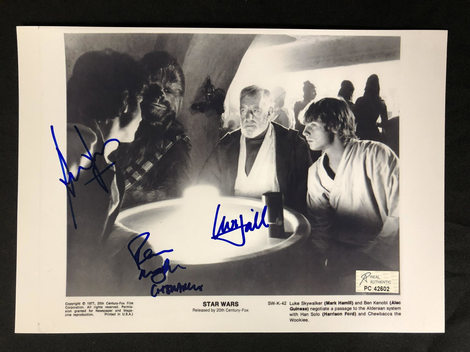 MARK HAMILL, HARRISON FORD AND ALEC GUINESS MULTI-SIGNED 8X10 PHOTO (RA COA): MARK HAMILL, HARRISON FORD AND ALEC GUINESS MULTI-SIGNED 8X10 PHOTO (RA COA)