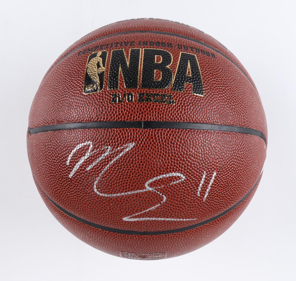 EVAN MOBLEY SIGNED SPALDING BASKETBALL (BECKETT COA) (1 of 3)
