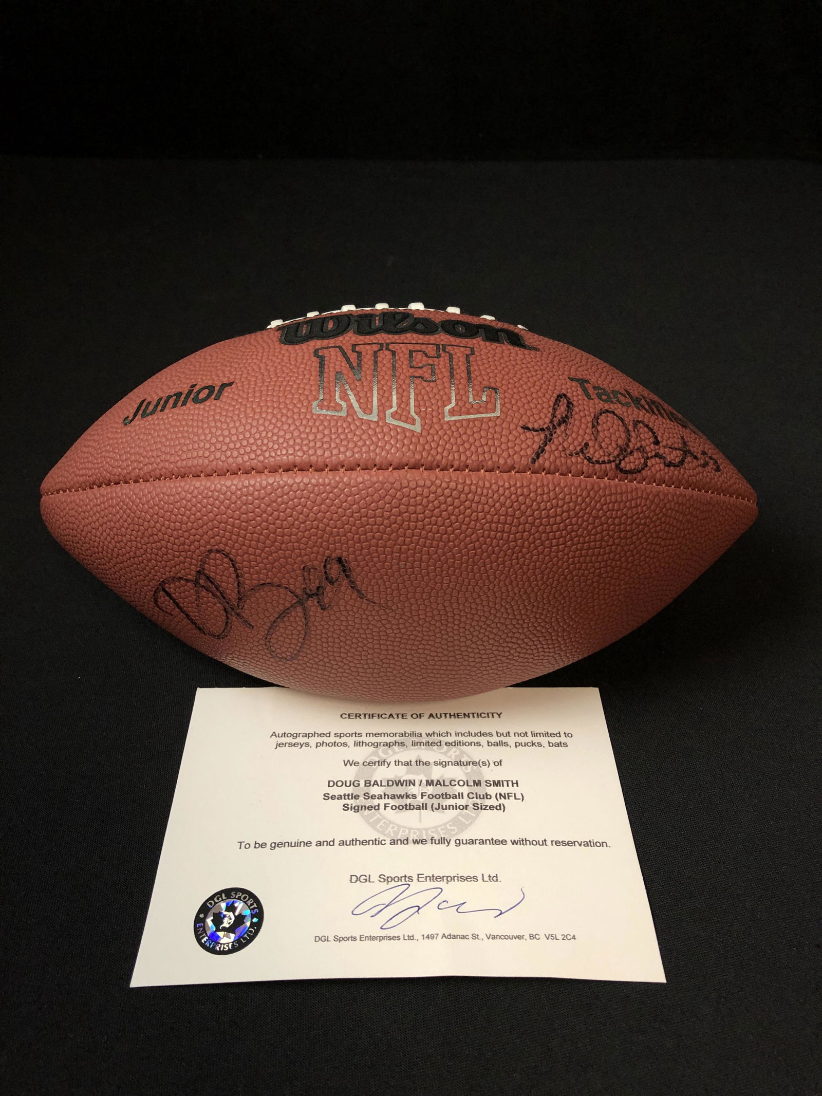 DOUG BALDWIN AND MALCOLM SMITH DUAL SIGNED SEATTLE SEAHAKS FOOTBALL (DGL COA) (1 of 3)