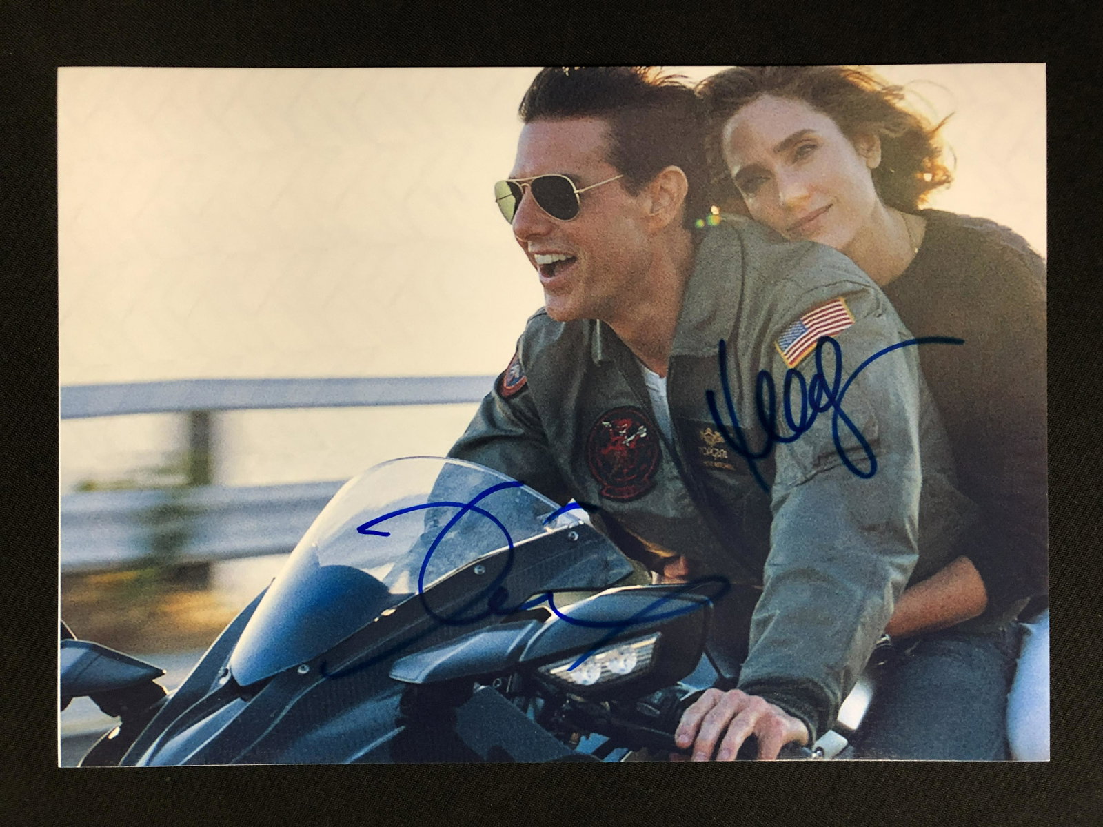 TOM CRUISE AND JENNIFER CONNELLY SIGNED TOP GUN 8 X 10 (RA COA): TOM CRUISE AND JENNIFER CONNELLY SIGNED TOP GUN 8 X 10 (RA COA)