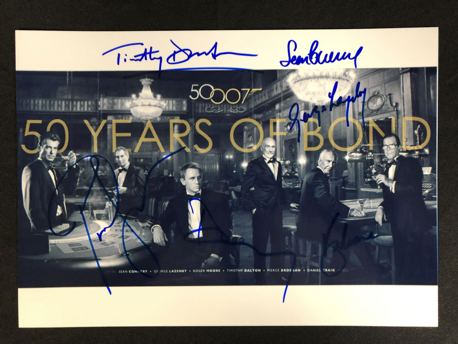 JAMES BOND 50 YEARS MULTI SIGNED 8 X 10 (RA COA) (1 of 2)