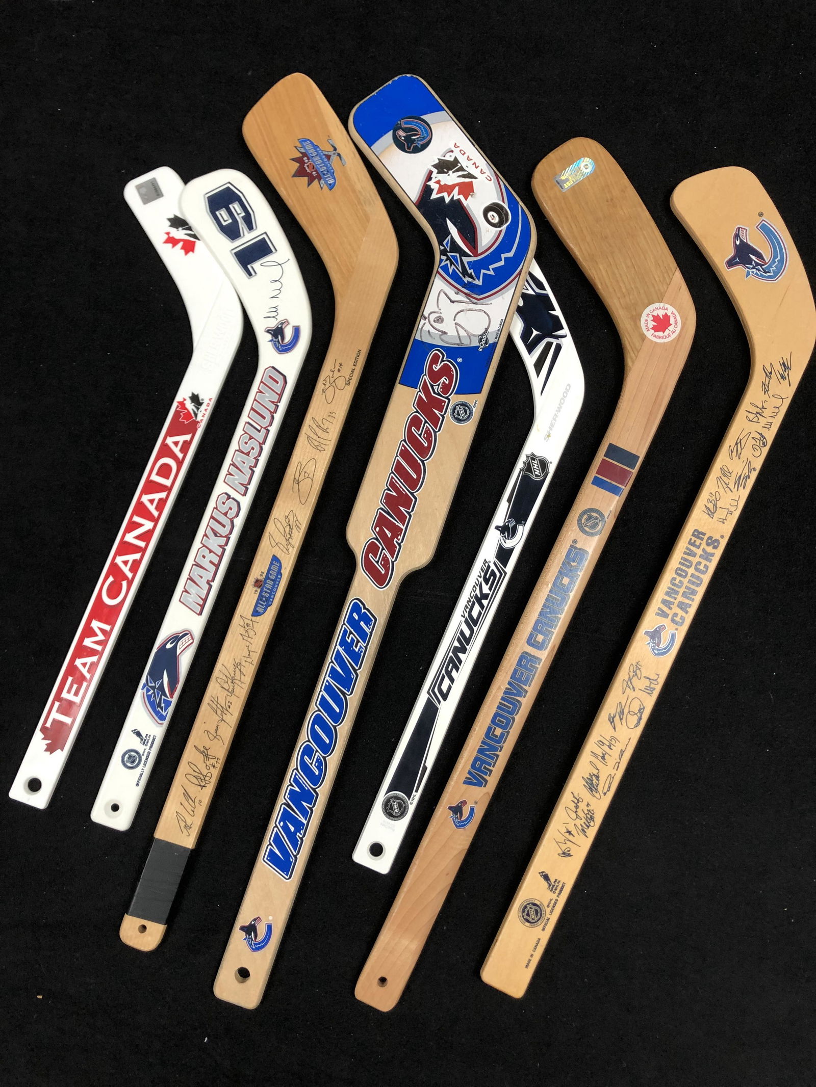 VINTAGE VANCOUVER CANUCKS MINI STICK LOT (1 of 1)