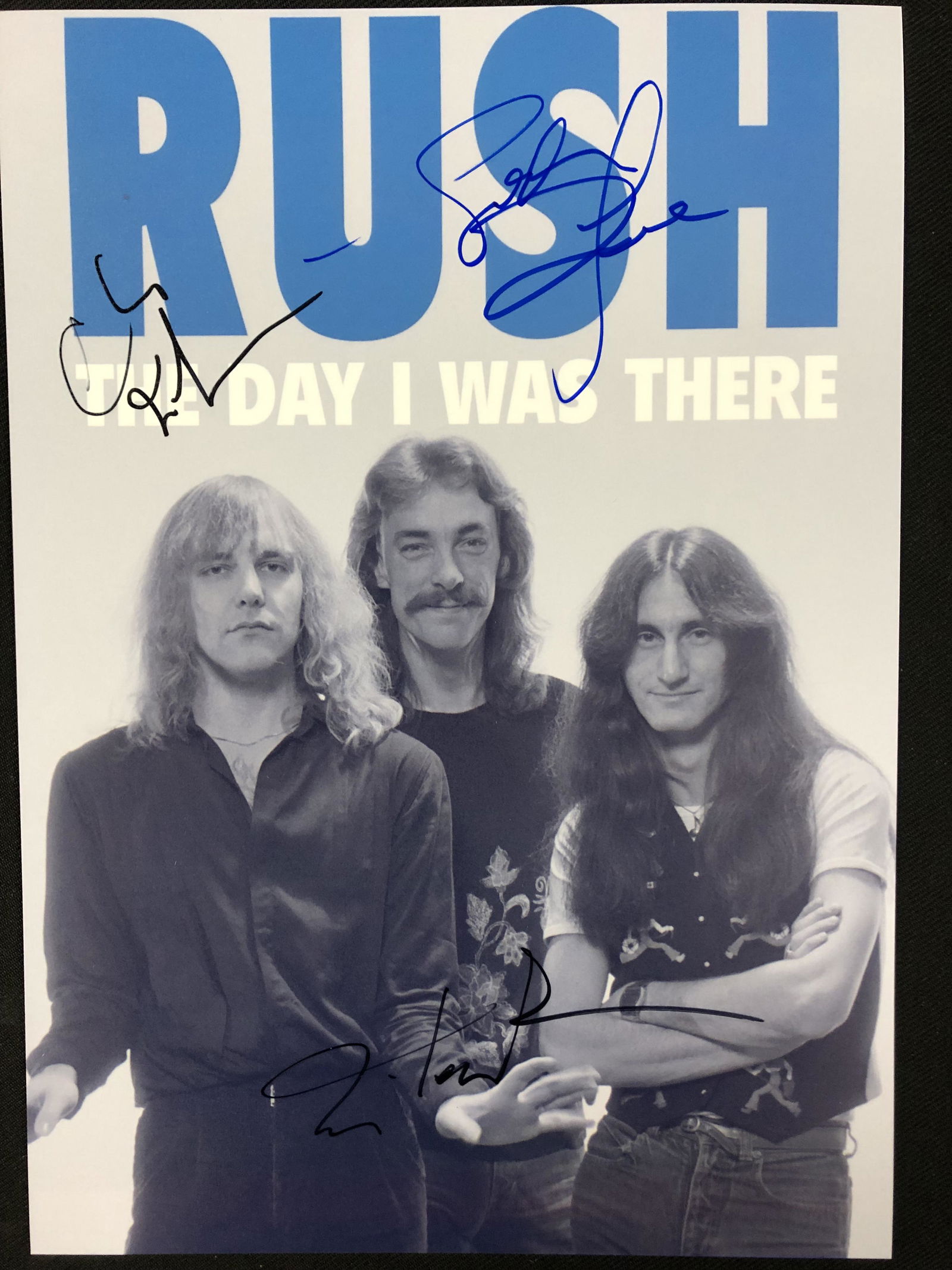 RUSH GROUP SIGNED 8X10 PHOTO (RA COA) (1 of 2)