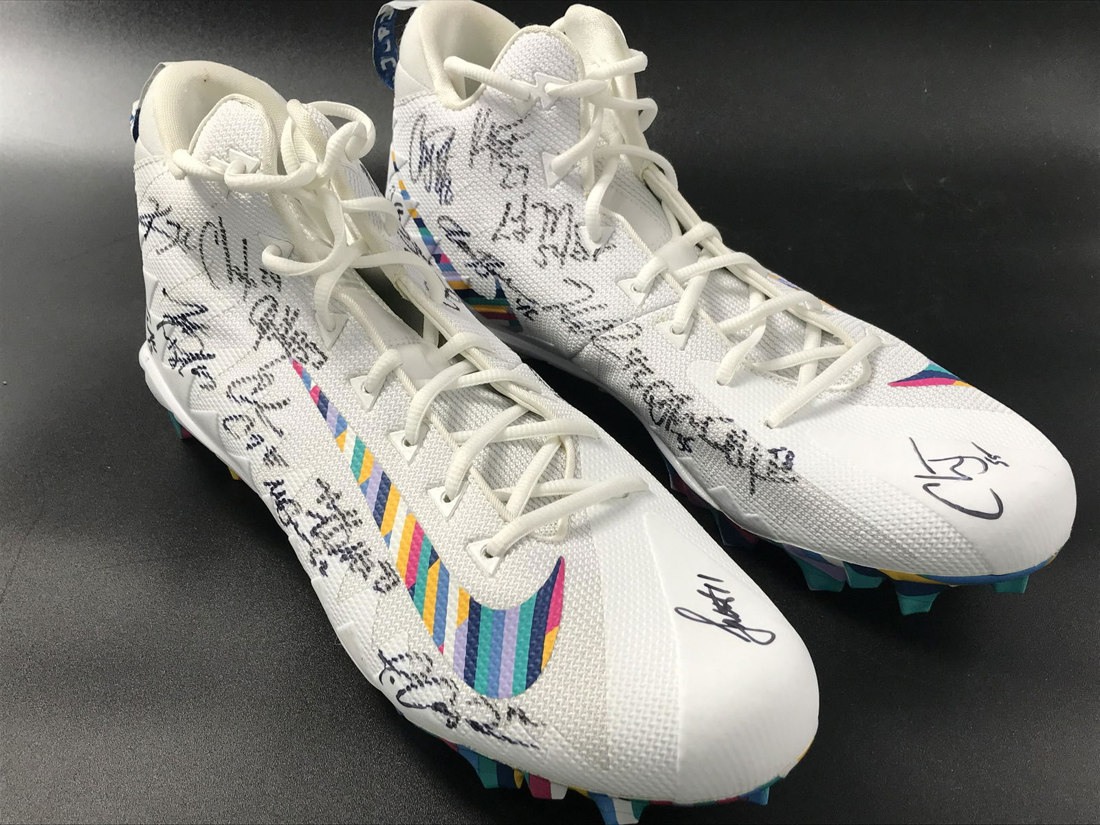 ARIZONA CARDINALS TEAM SIGNED GAME USED CLEATS; LARRY FITZGERALD AND CHANDLER JONES ON TOES (CARDINA (1 of 6)