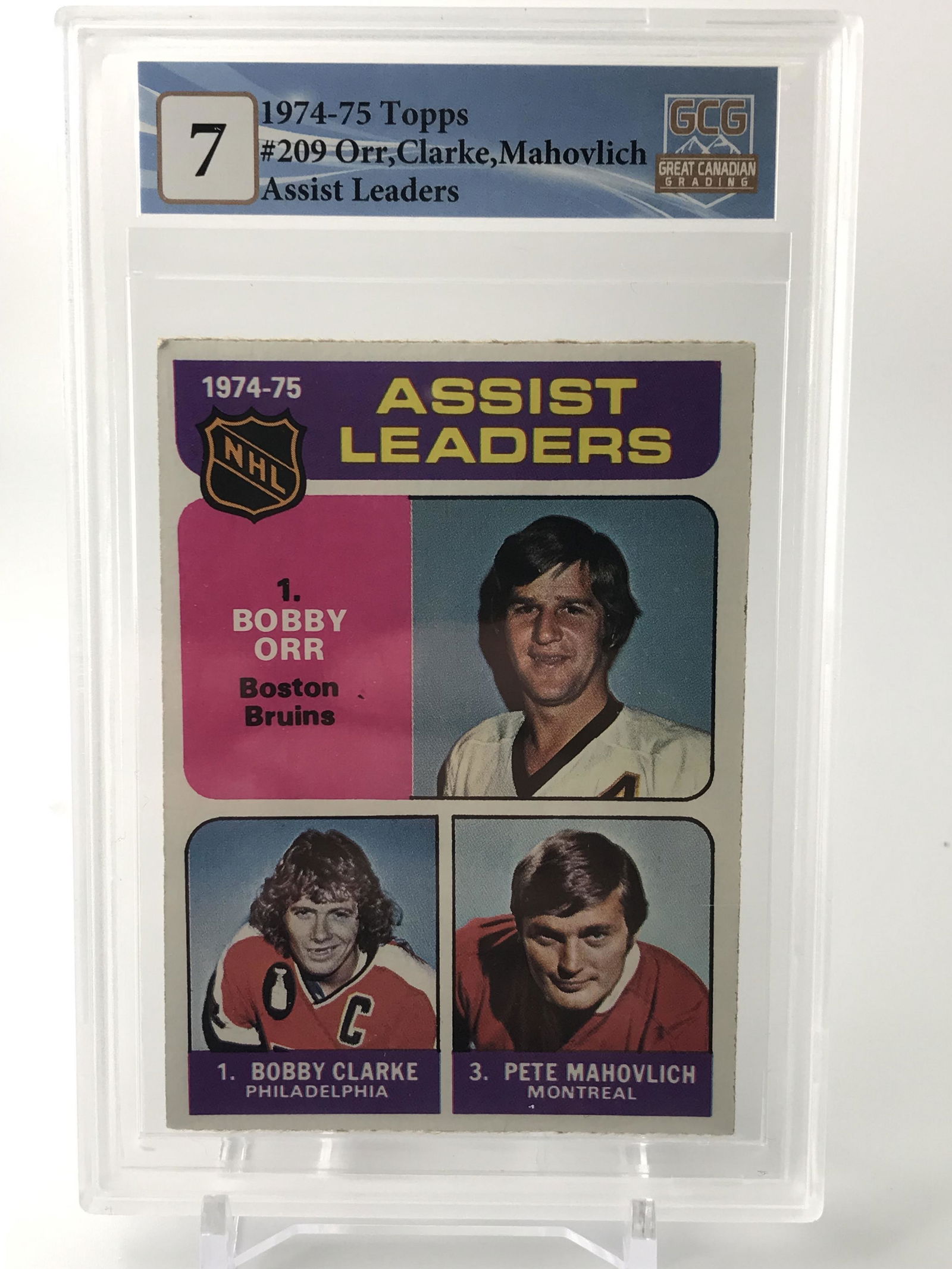 1974 -75 TOPPS #209 ORR,CLARKE,MAHOVLICH ASSIST LEADERS GCG GRADED 7 (1 of 2)