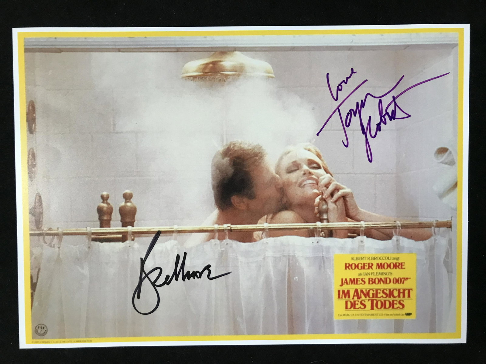 ROGER MOORE AND TANYA ROBERTS SIGNED JAMES BOND 8 X 10 (RA COA): ROGER MOORE AND TANYA ROBERTS SIGNED JAMES BOND 8 X 10 (RA COA)