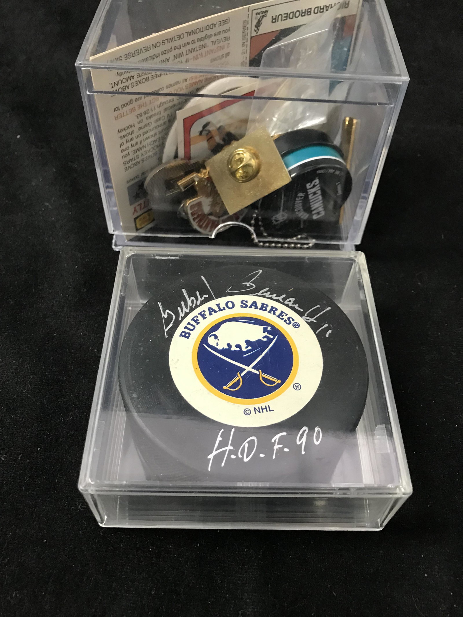 GILBERT PEAREAULT SIGNED SABRES PUCK AND VINTAGE PINS LOT: 1