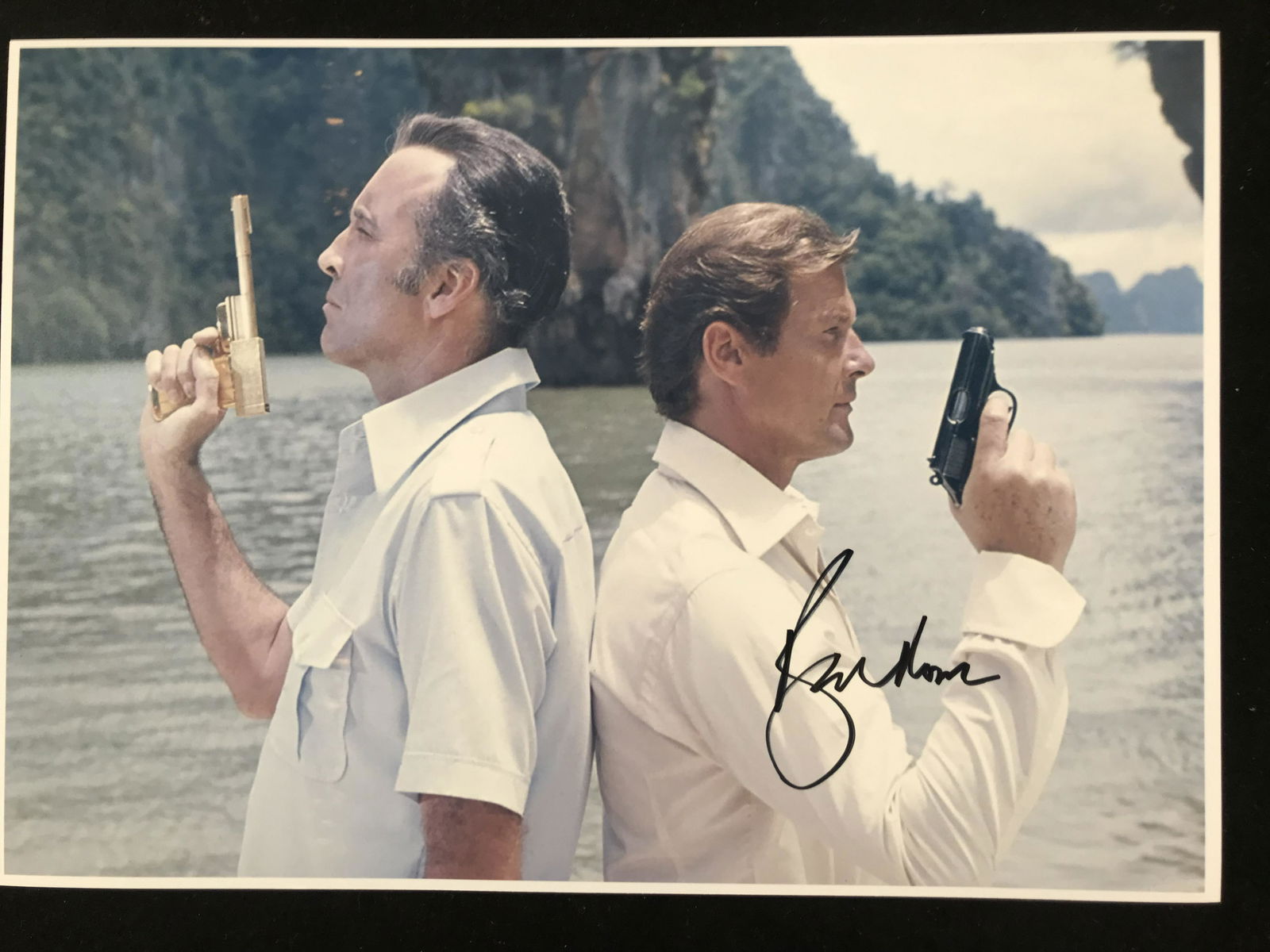 ROGER MOORE SIGNED JAMES BOND 8X10 (RA COA) (1 of 2)