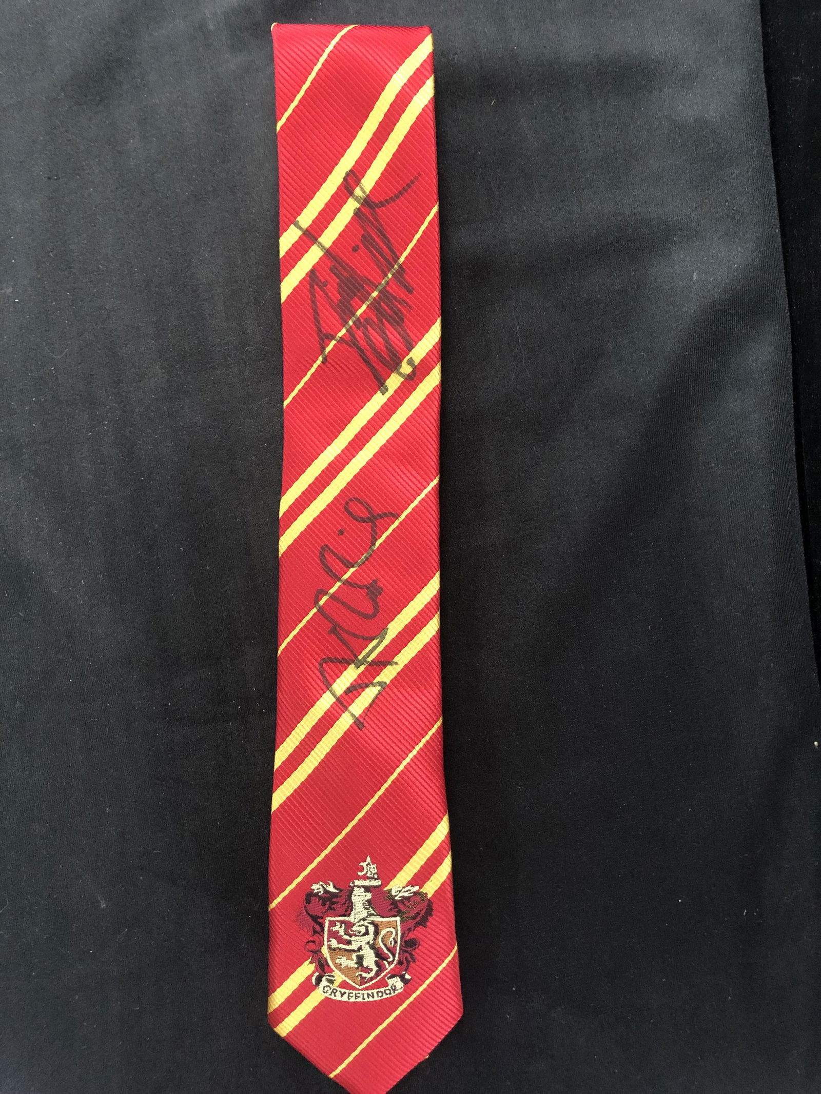 J.K ROWLING AND DANIEL RADCLIFFE SIGNED HARRY POTTER GRYFFINDOR NECK TIE (RA COA) (1 of 4)