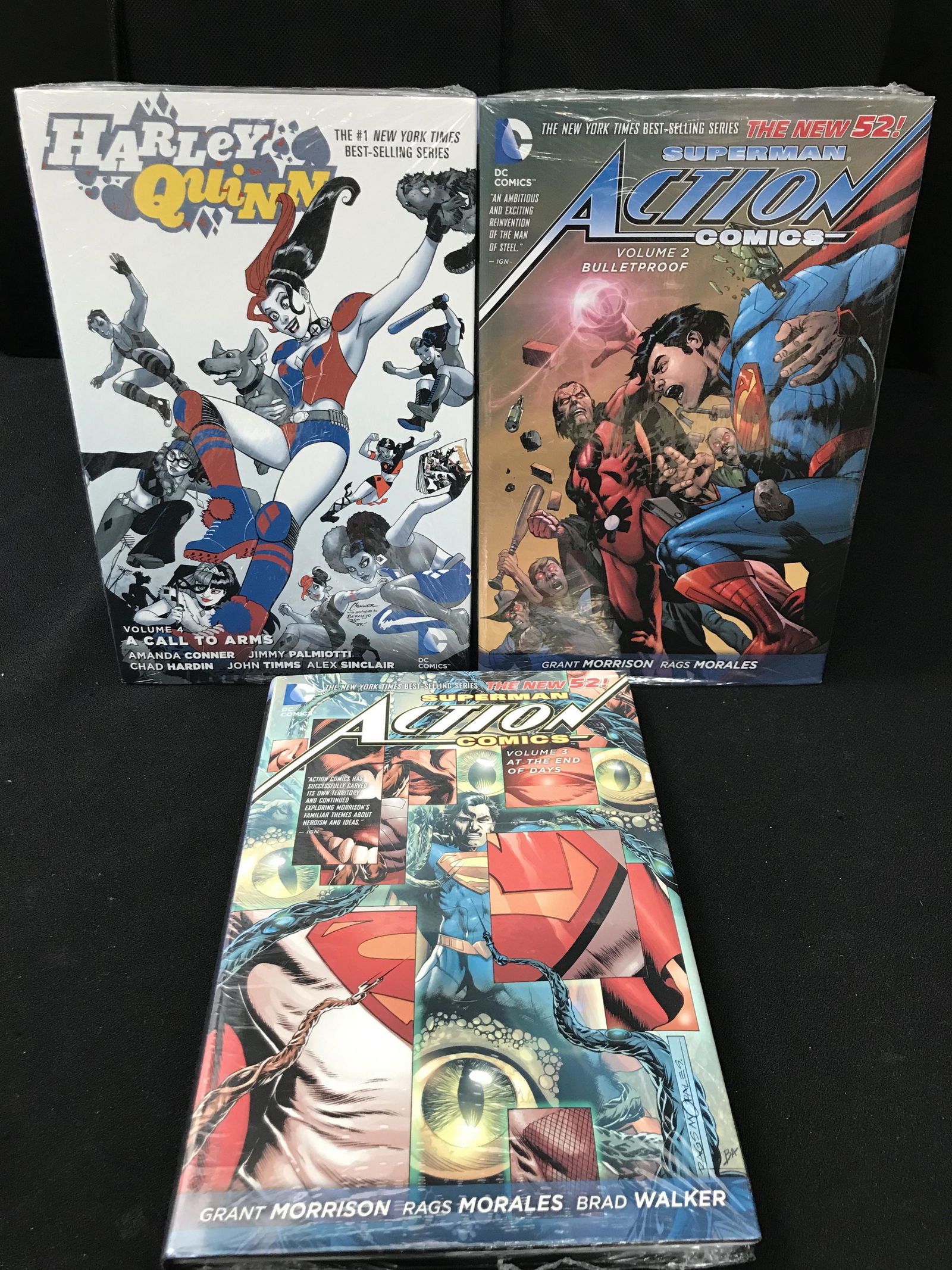 HARD COVER COMIC BOOK LOT (HARLEY QUINN/ACTION) (1 of 1)