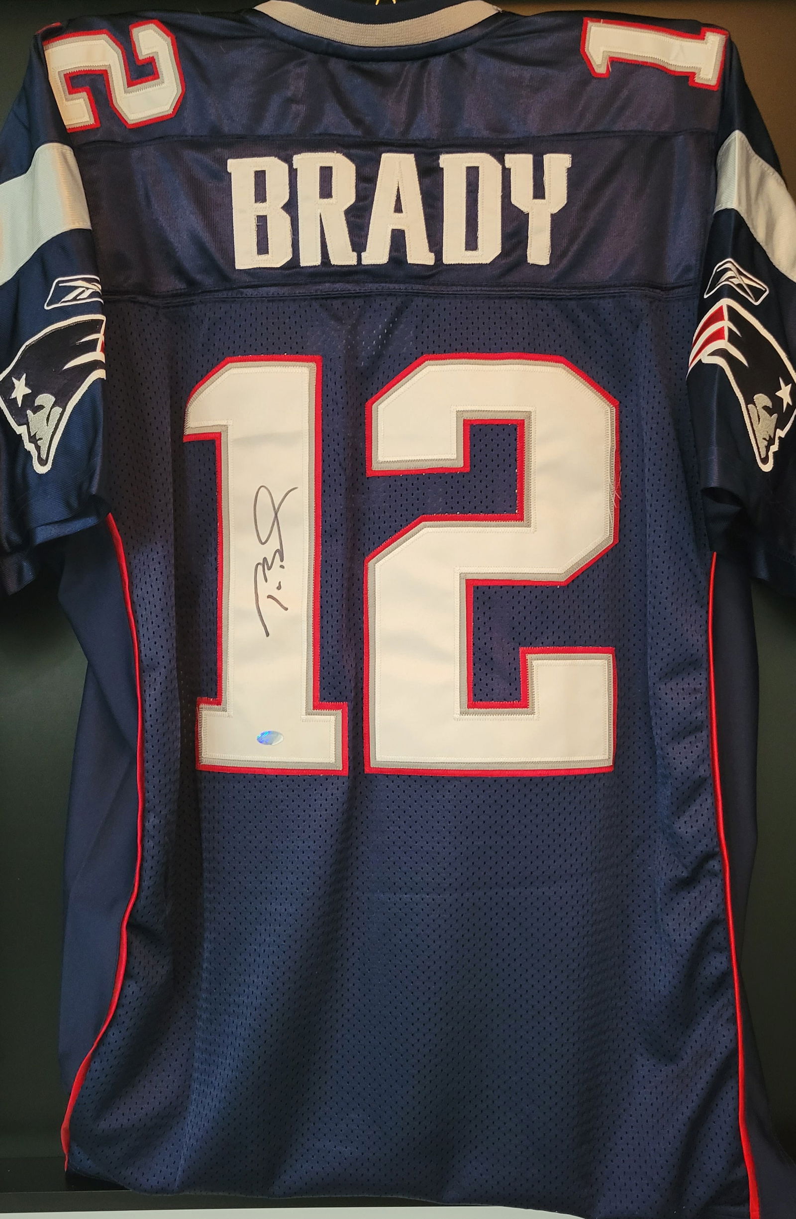 SIGNED TOM BRADY FOOTBALL JERSEY: Prices are in Canadian dollars