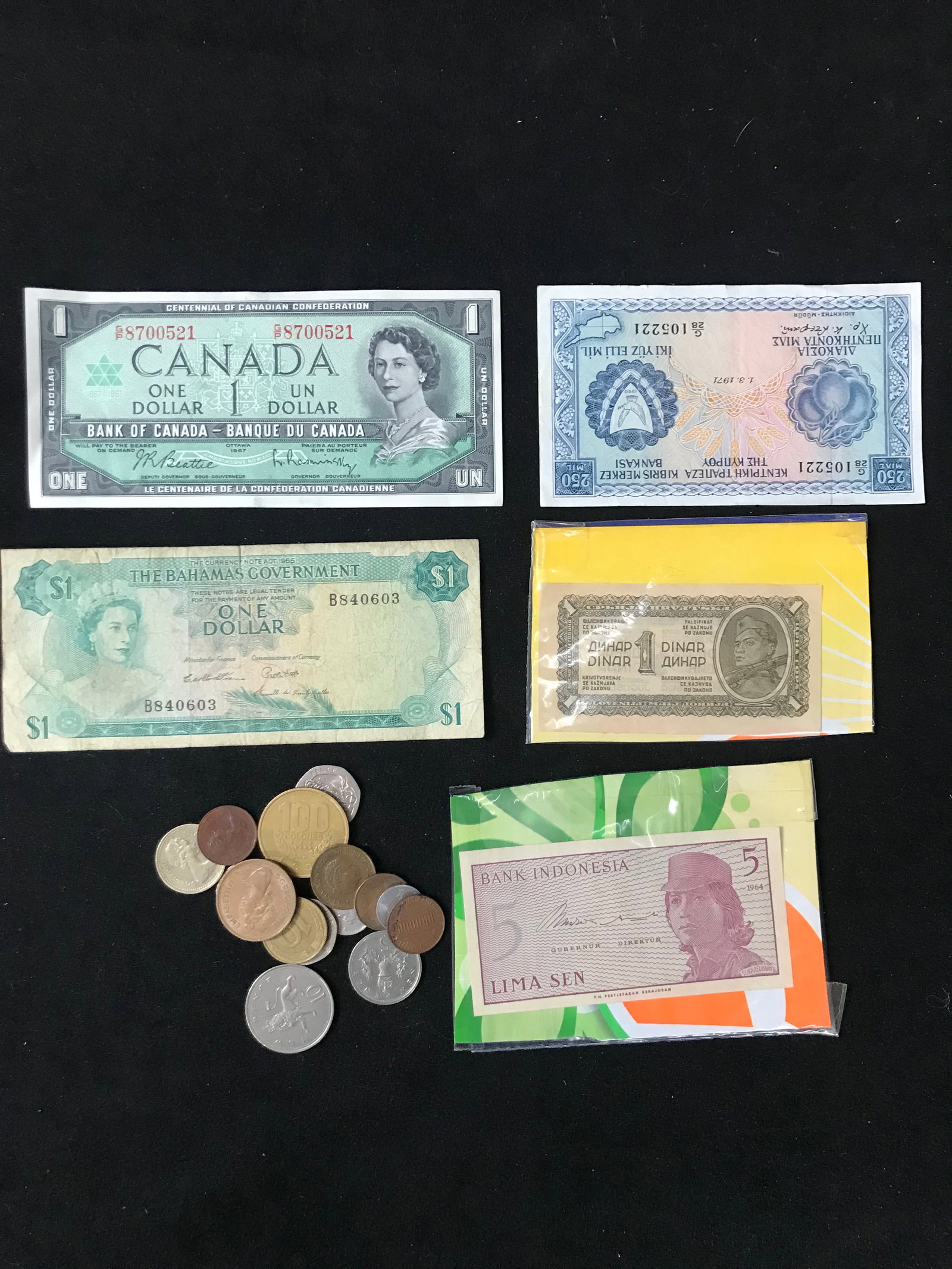 WORLD COIN AND CURRENCY LOT: Prices are in Canadian dollars