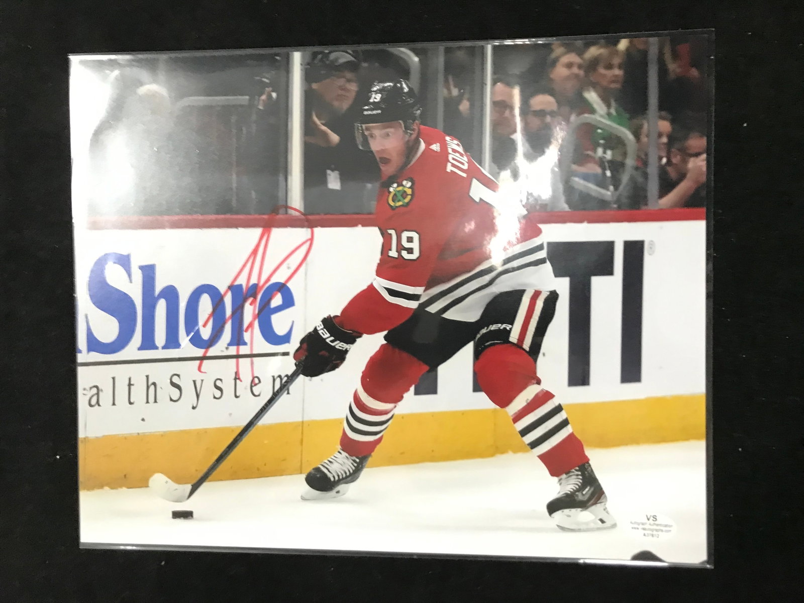 JONATHAN TOEWS SIGNED CHICAGO BLACKHAWKS 8 X 10 (VS COA): Prices are in Canadian dollars