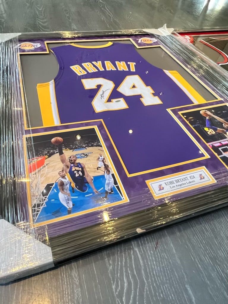 KOBE BRYANT SIGNED AND CUSTOM FRAMED L.A LAKERS JERSEY (IPA COA) (1 of 4)