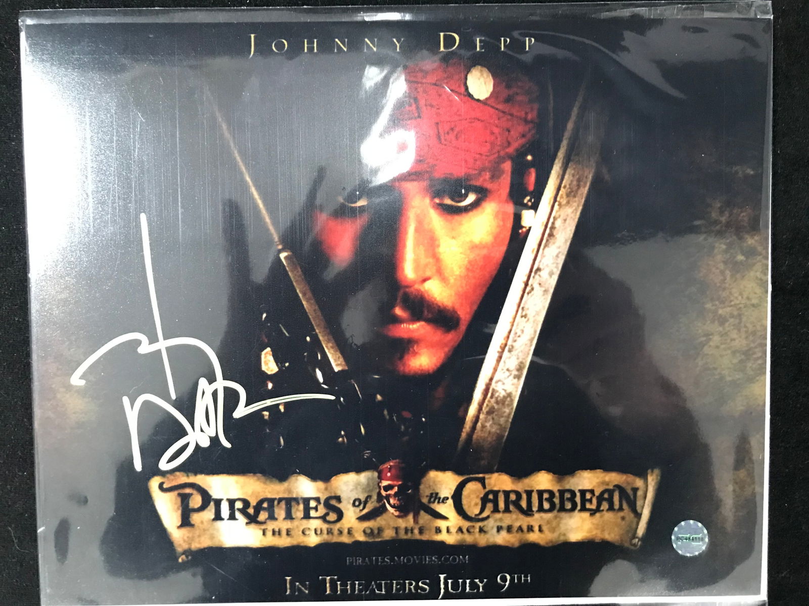 JOHNNY DEPP SIGNED PIRATES OF THE CARIBBEAN 8 X 10 (PRO CERT COA) (1 of 2)