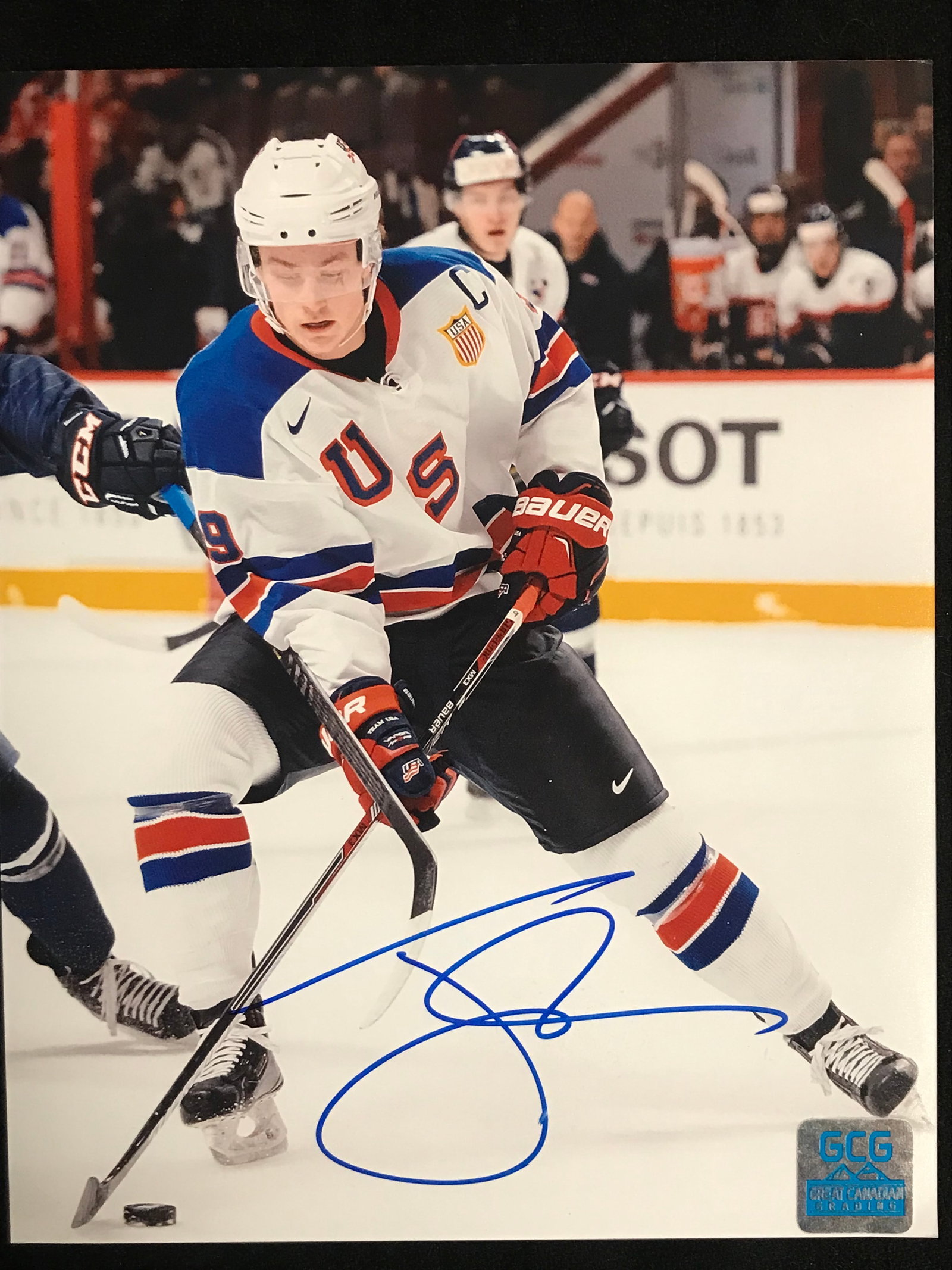JACK EICHEL SIGNED TEAM USA 8 X 10 (GCG HOLO): Prices are in Canadian dollars