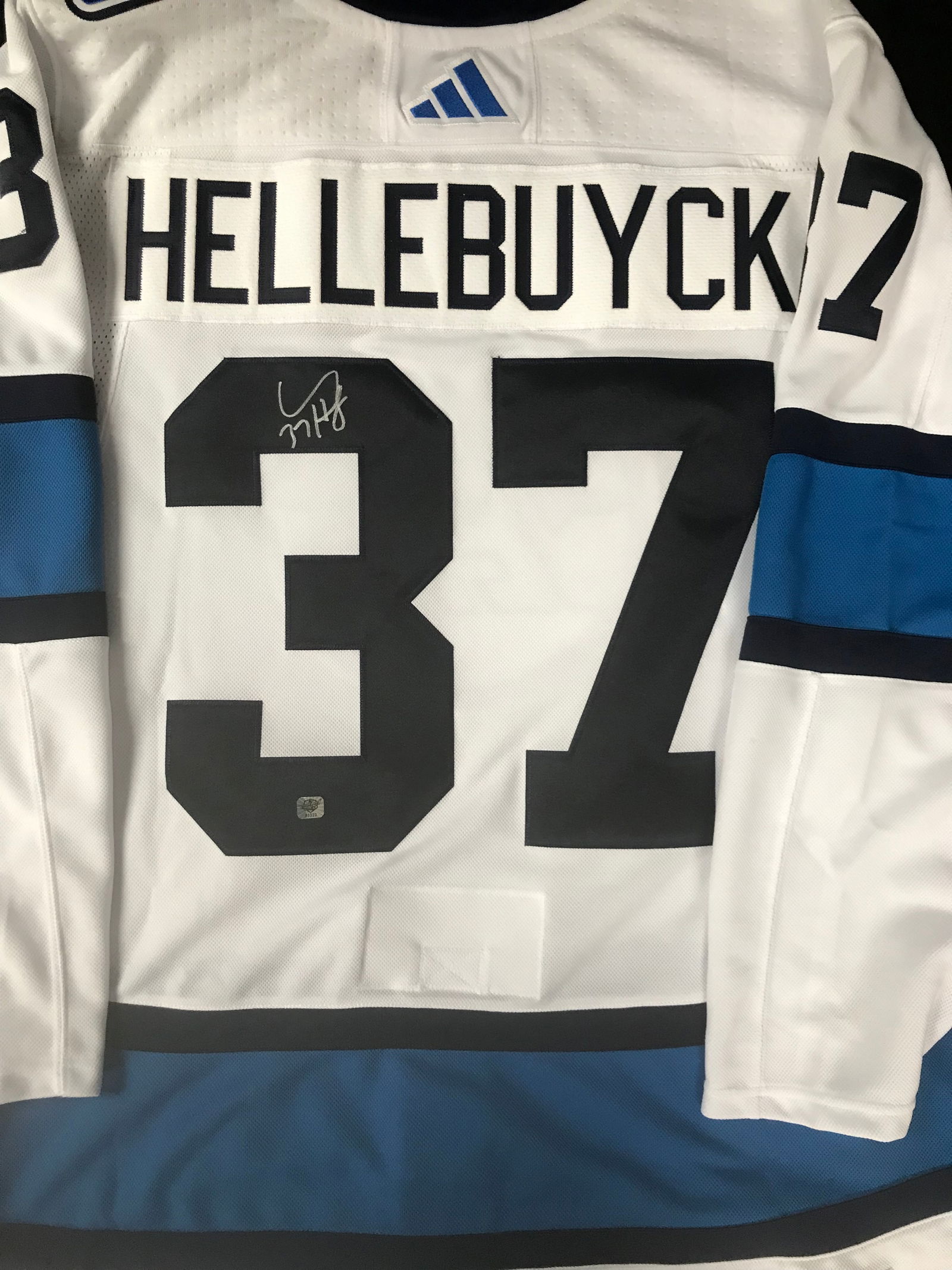 CONNOR HELLEBUYCK SIGNED WINNIPEG JETS REVERSE RETRO JERSEY (EAST COAST COA) (1 of 3)