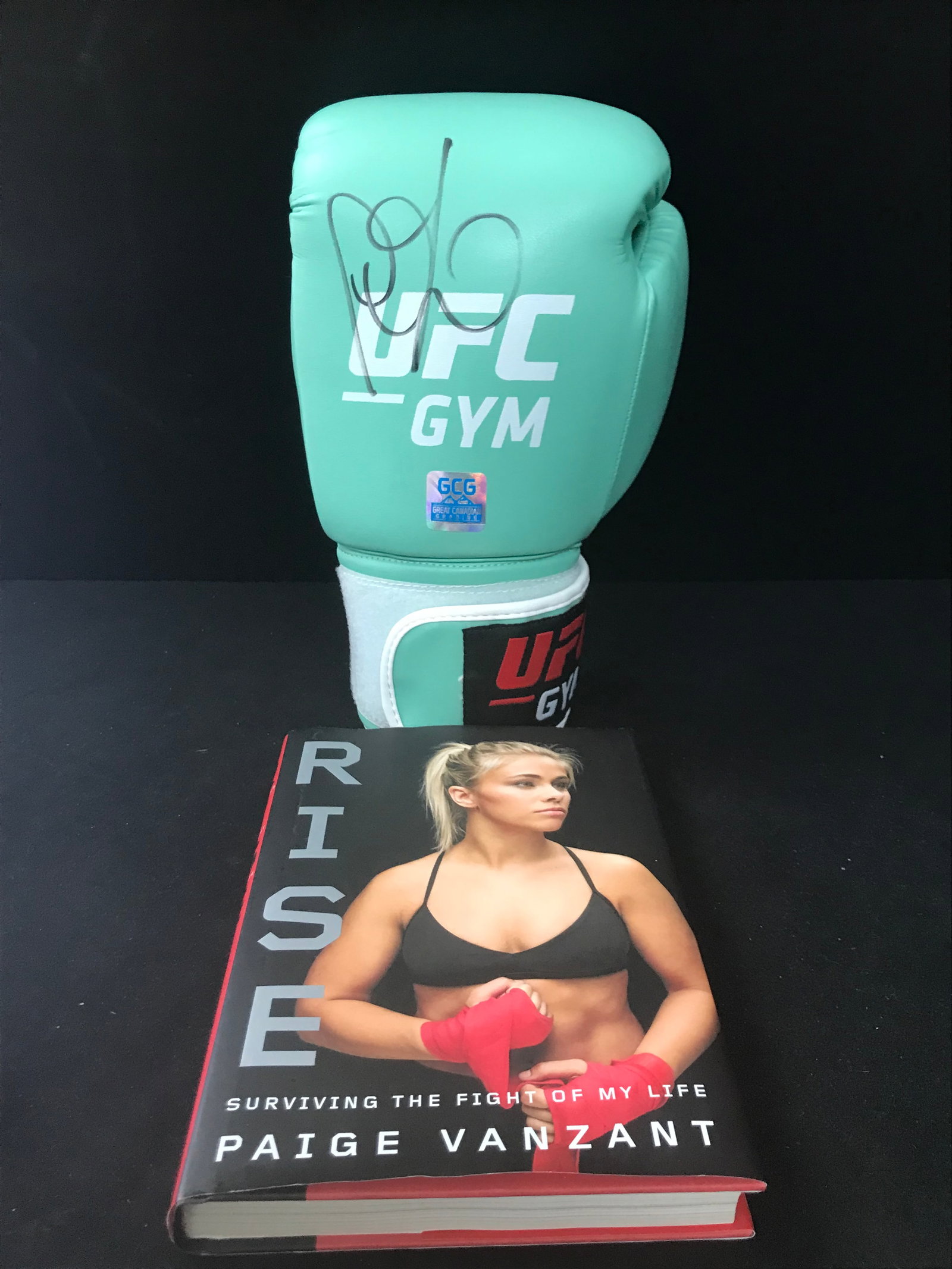 UFC,BKFC,ONLYFANS STAR PAIGE VANZANT BOOK AND SIGNED UCF BOXING GLOVE (GCG COA): Prices are in Canadian dollars