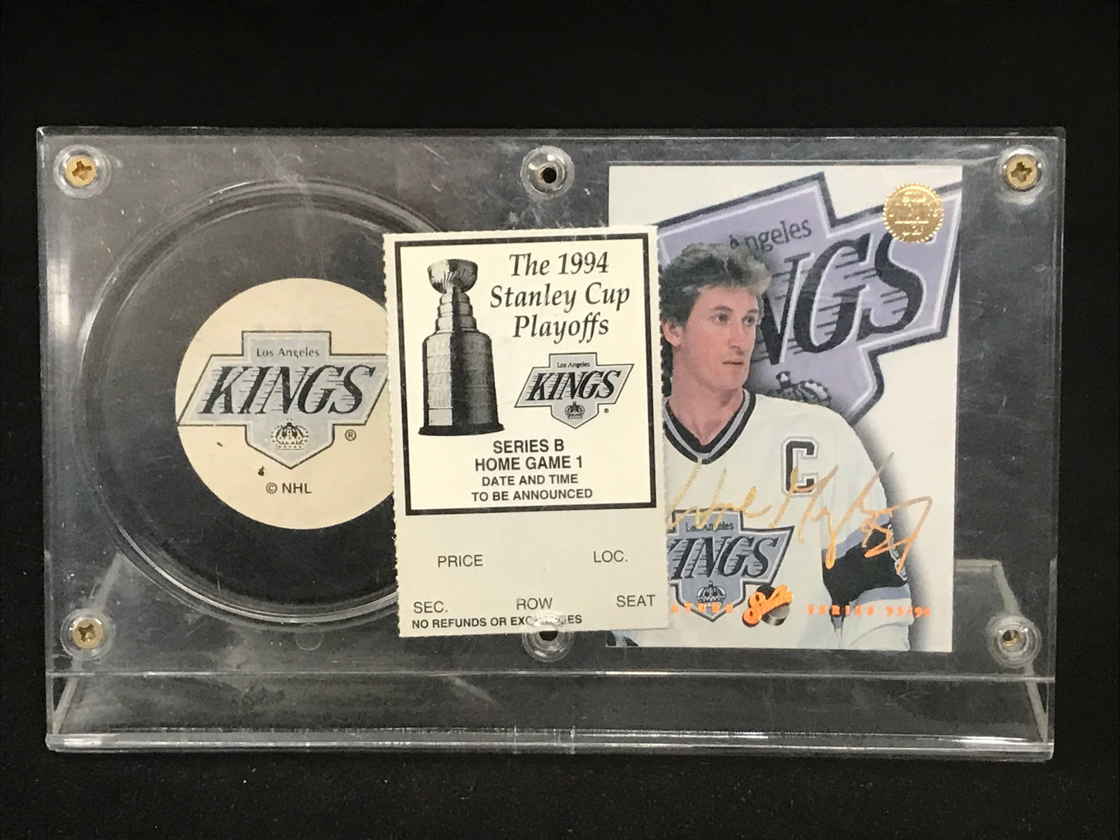 1994 WAYNE GRETZKY KINGS PUCK DISPLAY WITH PLAYOFF TICKET (1 of 1)