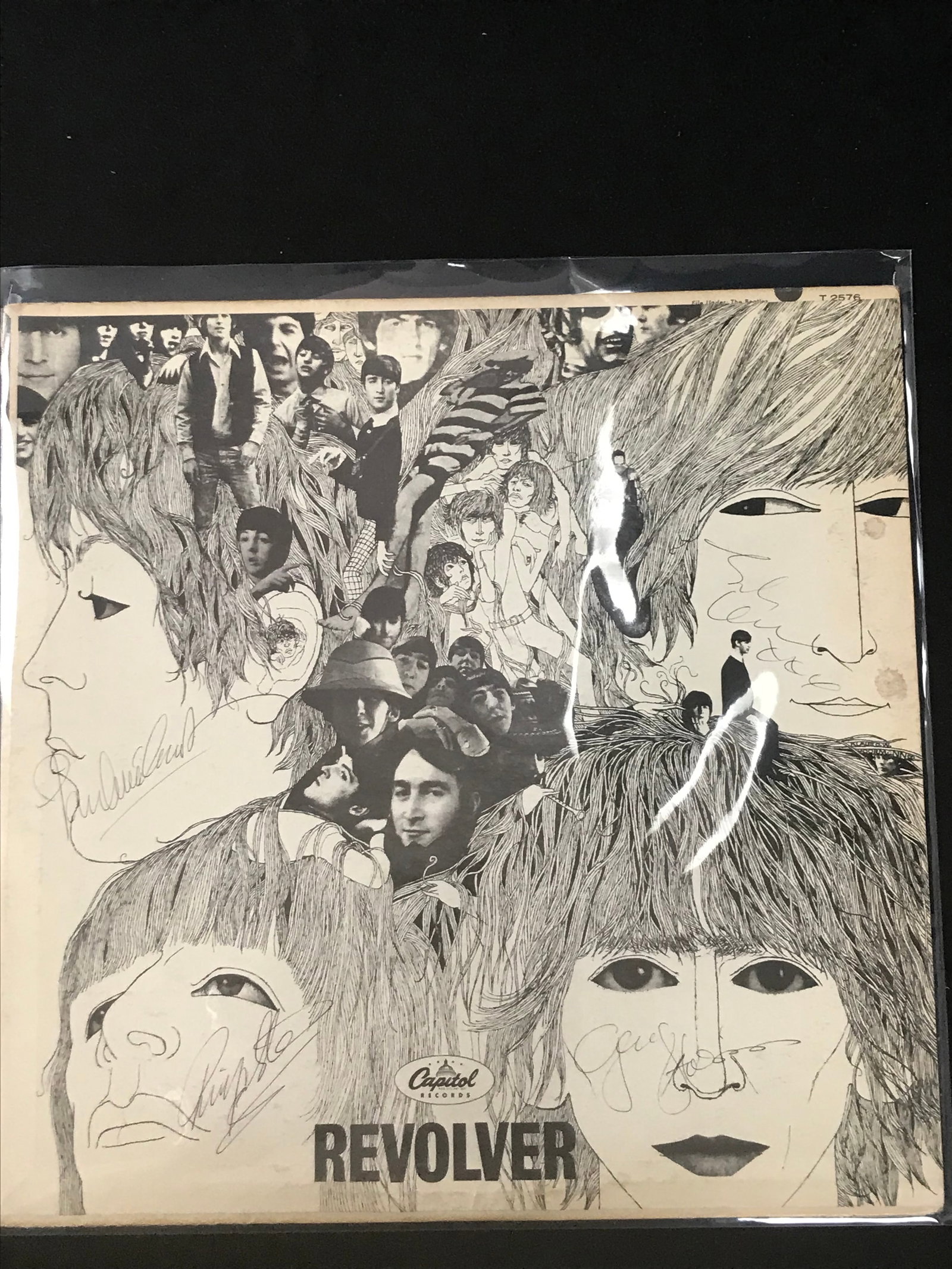 THE BEATLES BAND SIGNED REVOLVER RECORD ALBUM (PREMIER AUTHENTICS COA): Prices are in Canadian dollars