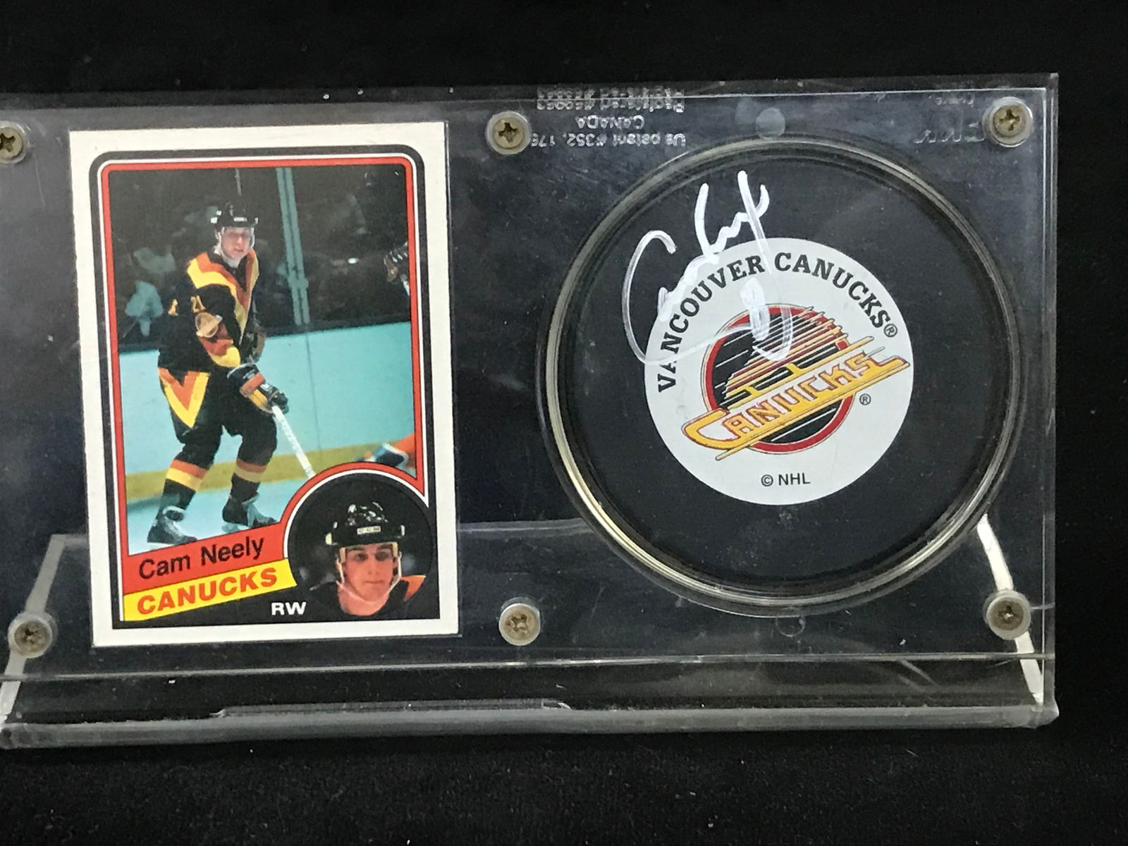 CAM NEELY SIGNED CANUCKS PUCK AND ROOKIE CARD DISPLAY (1 of 2)
