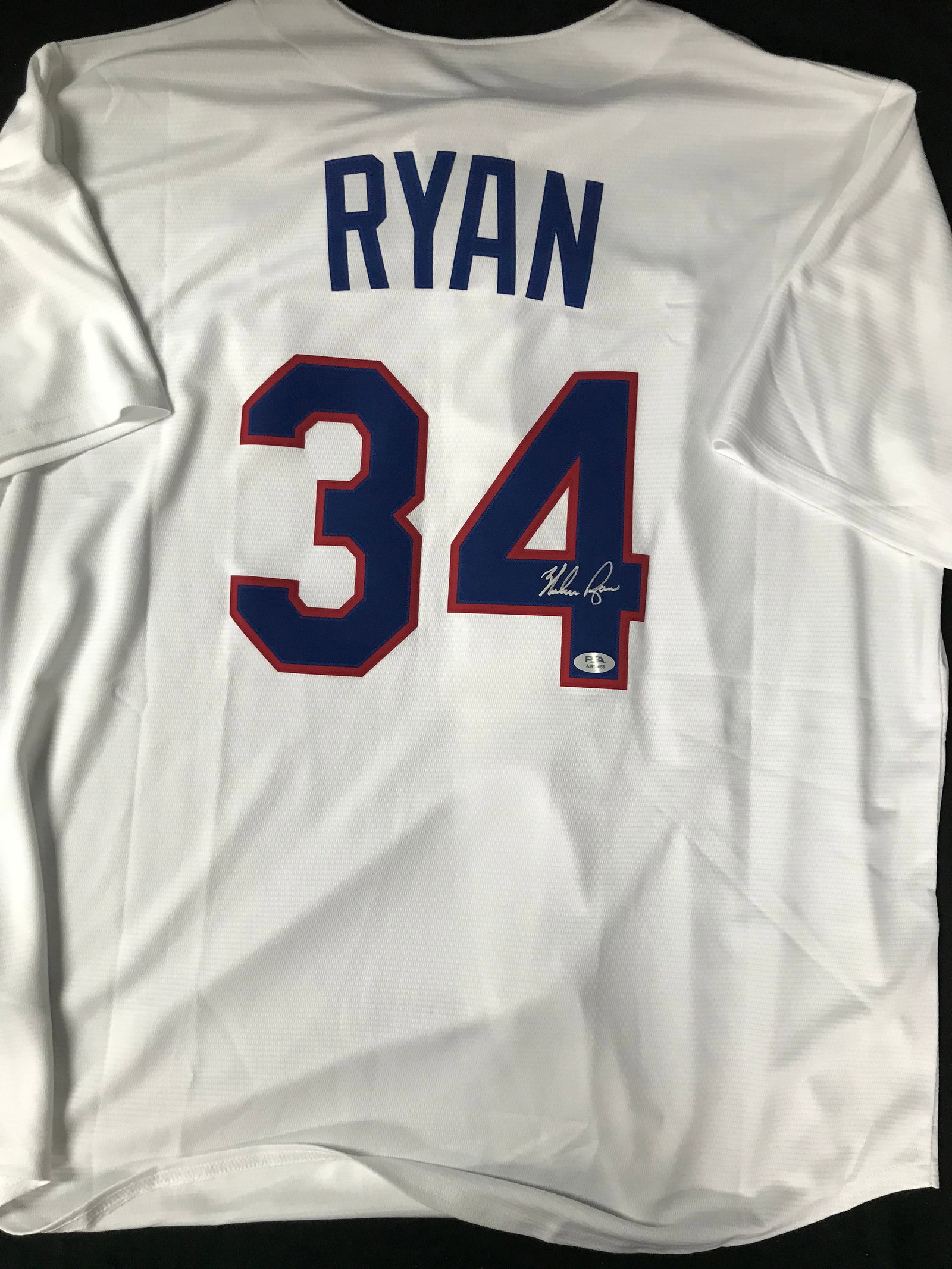 NOLAN RYAN SINGED TEXAS RANGERS MAJESTIC JERSEY (PSA COA): Prices are in Canadian dollars