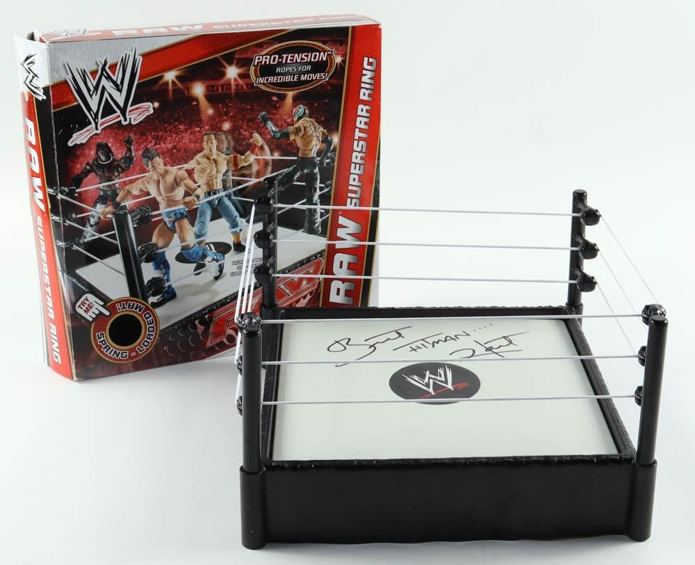 BRETT HART SIGNED WWF RING WITH BOX BECKETT COA: Prices are in Canadian dollars