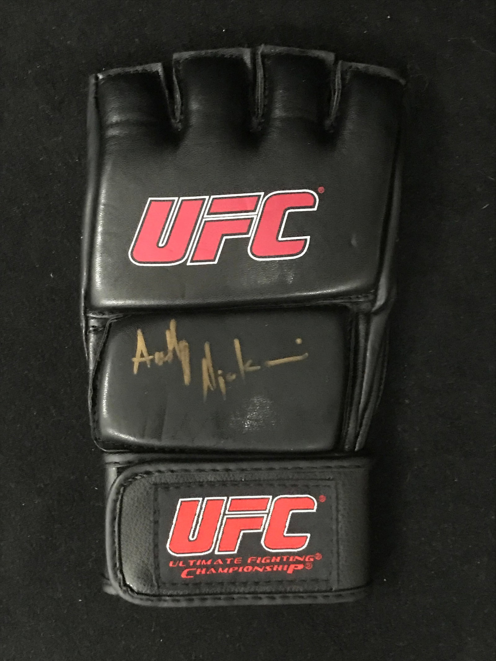 ANTHONY NJOKUANI SIGNED UFC FIGHT GLOVE (GCG HOLO): Prices are in Canadian dollars