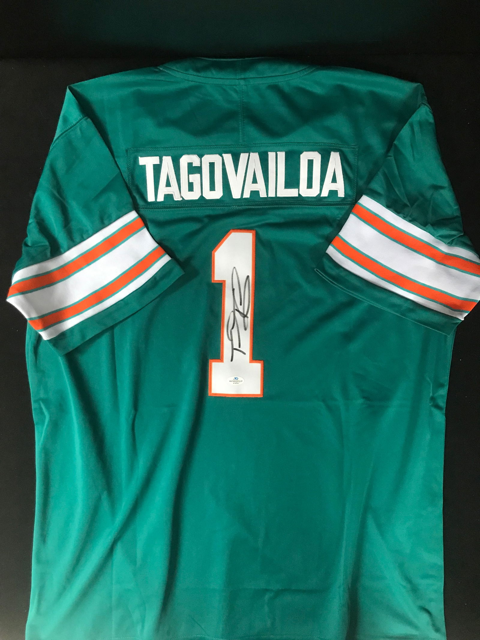 TUA TAGOVAILOA SIGNED MIAMI DOLPHINS JERSEY (5 STAR GRADING COA) (1 of 3)