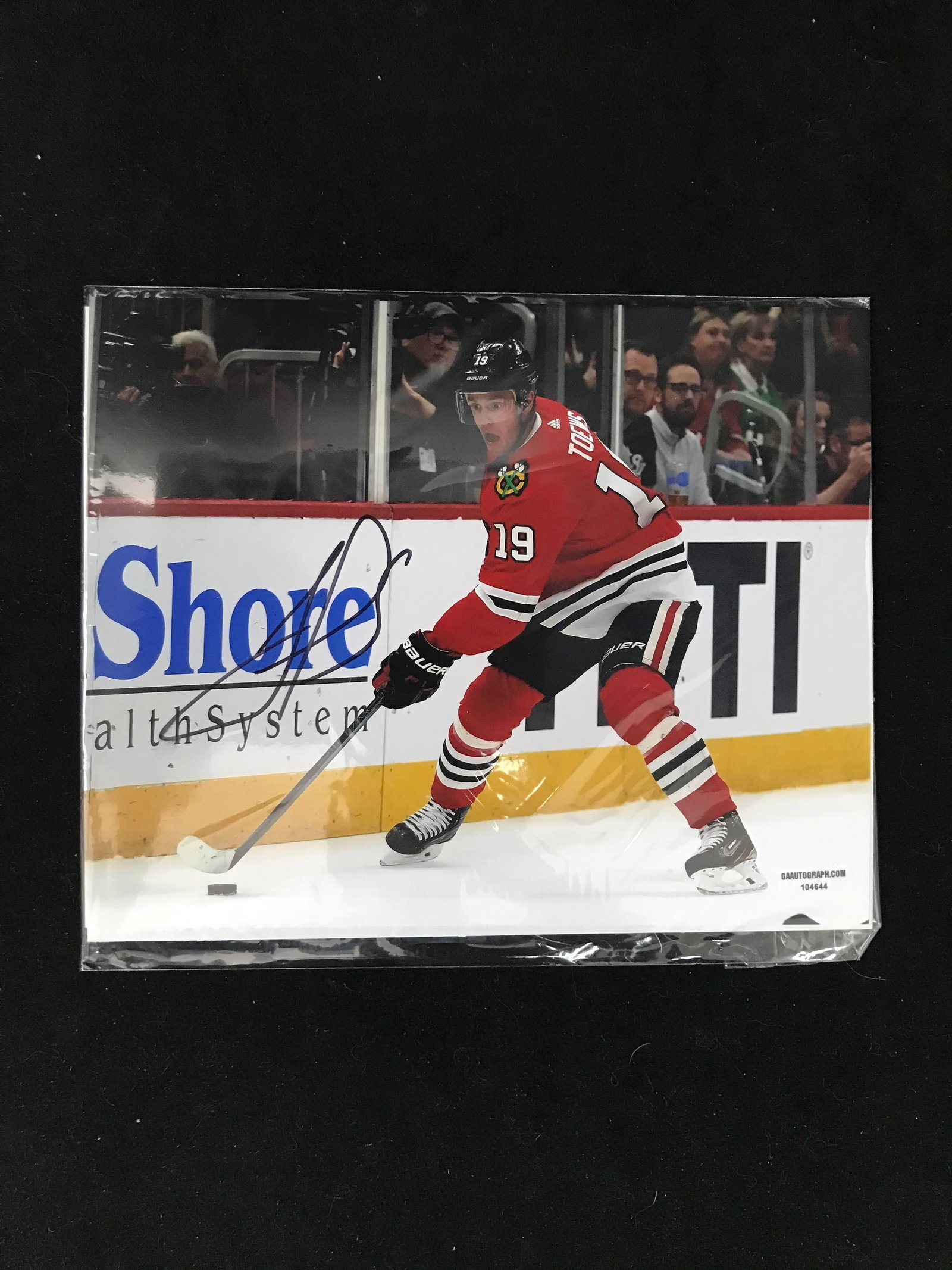 TOEWS SINGED 8X10 PHOTO GAA COA: Prices are in Canadian dollars