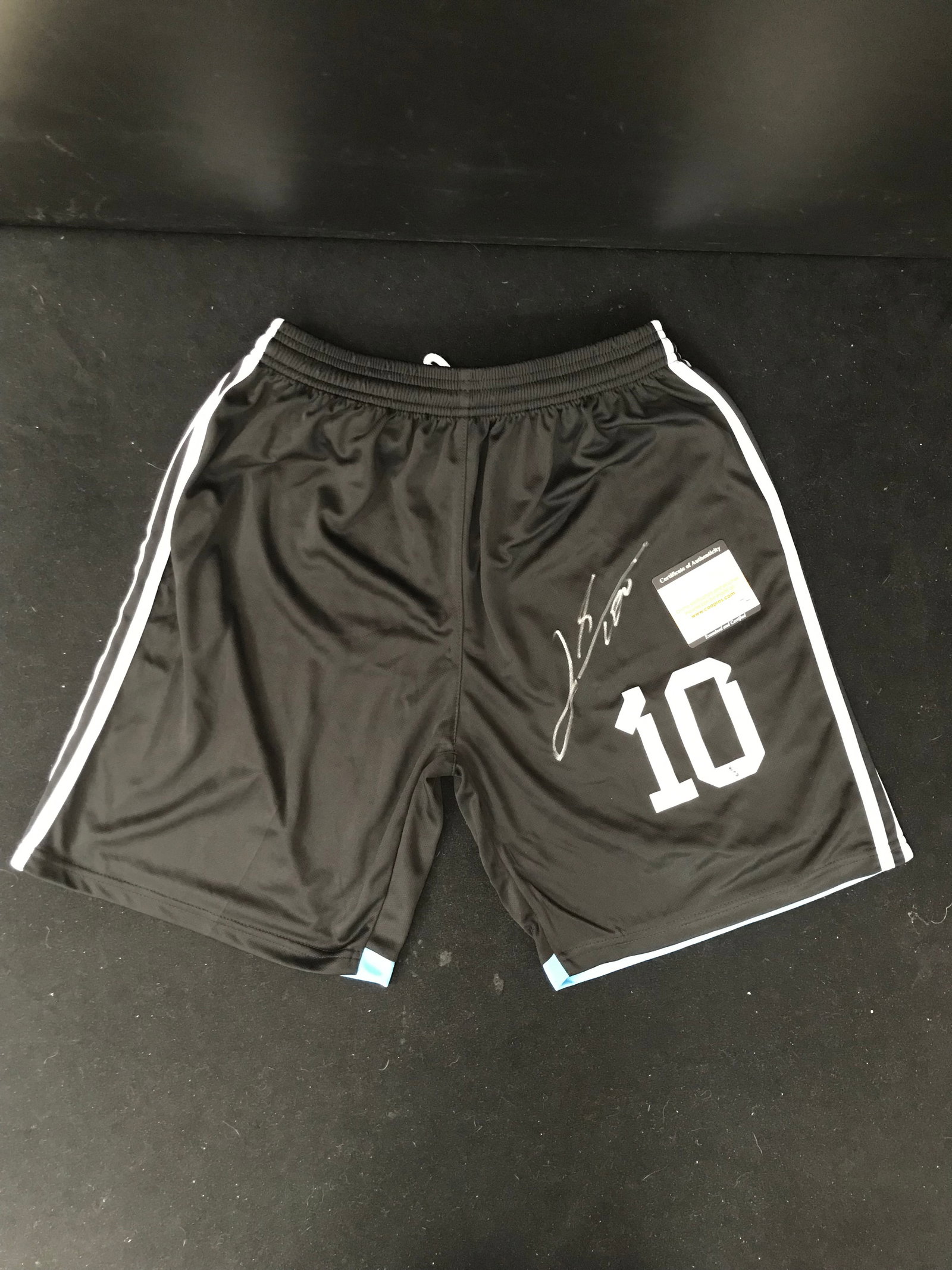 LIONAL MESSI SIGNED SIGNED SOCCER SHORTS (PRO CERT COA): Prices are in Canadian dollars