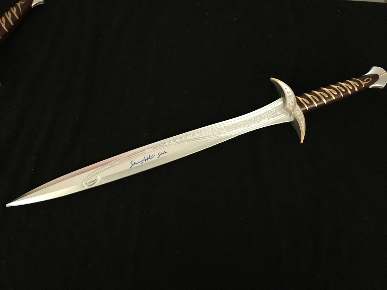 SEAN ASTIN SIGNED LORD OF THE RINGS STING SWORD INSCRIBED "SAM" (WWOC COA): Prices are in Canadian dollars