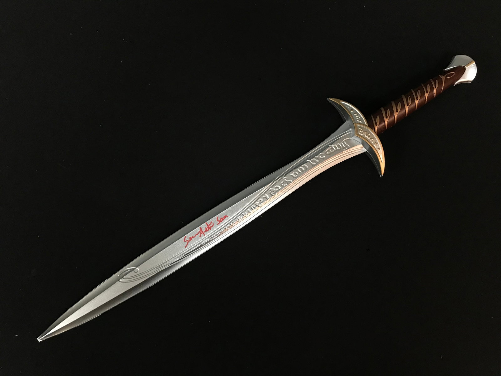 SEAN ASTIN SIGNED LORD OF THE RINGS STING SWORD INSCRIBED "SAM" (WWOC COA): Prices are in Canadian dollars