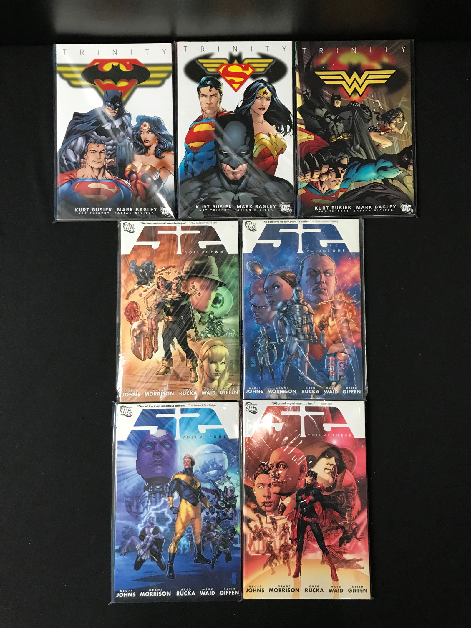 LOT OF 7 COMICS INCLUDING THREE TRINITY AND 52 VOLUMES 1-4 (DC) (1 of 1)