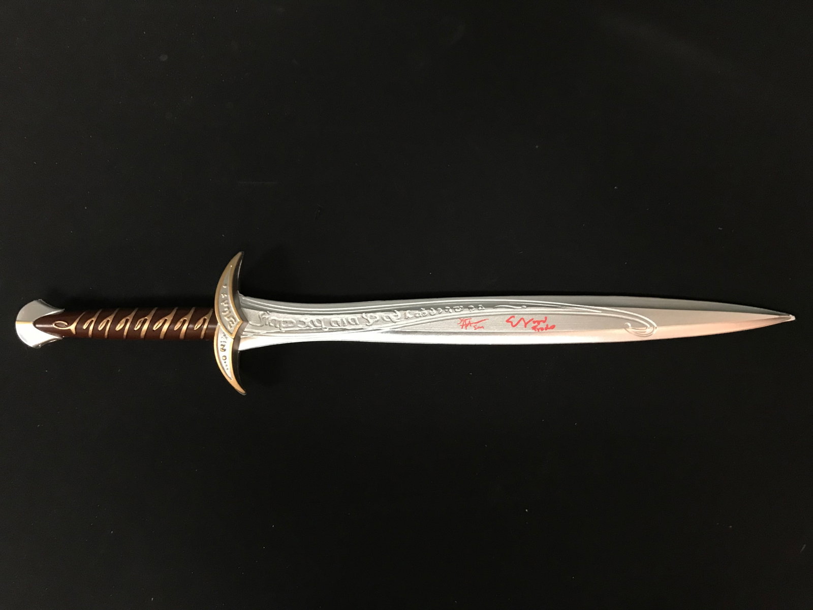 ELIJAH WOOD AND SEAN ASTIN SIGNED AND INSCRIBED LOTR STING SWORD (WWOC COA): Prices are in Canadian dollars