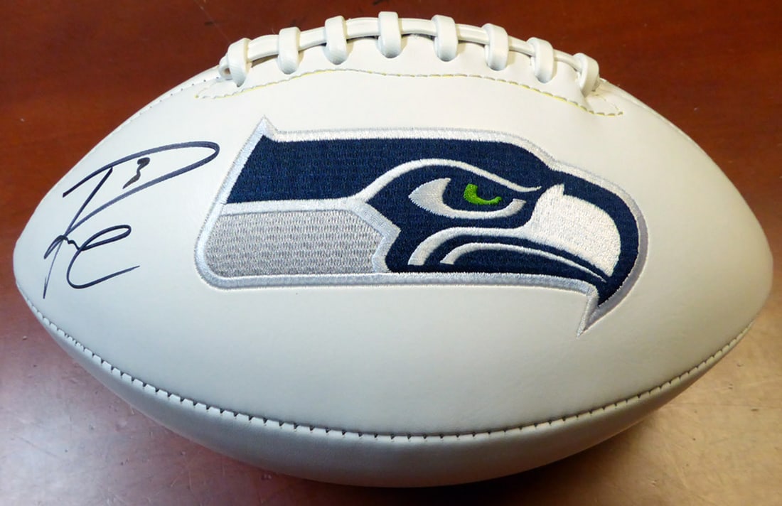 RUSSELL WILSON SIGNED SEATTLE SEAHAWKS FOOTBALL (BECKETT COA) (1 of 3)