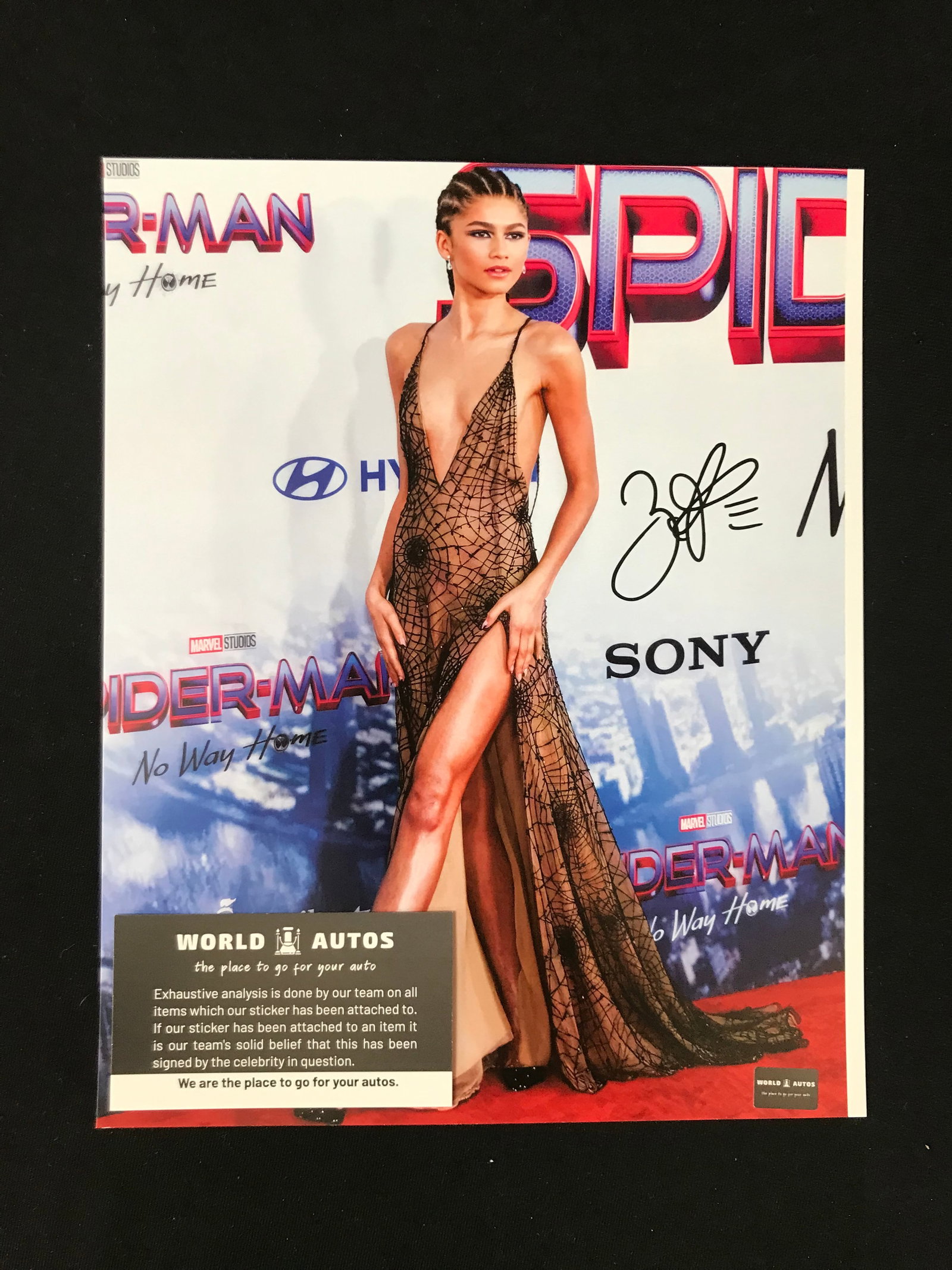 ZENDAYA SIGNED 8X10 PHOTO (WORLD AUTOS COA): Prices are in Canadian dollars