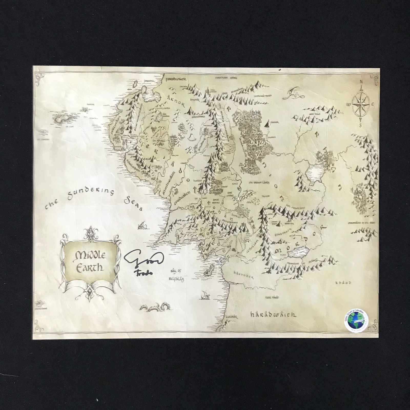 MAP OF MIDDLE EARTH SIGNED AND INSCRIBED 'FRODO' BY ELIJAH WOOD (WWOC COA) (1 of 1)