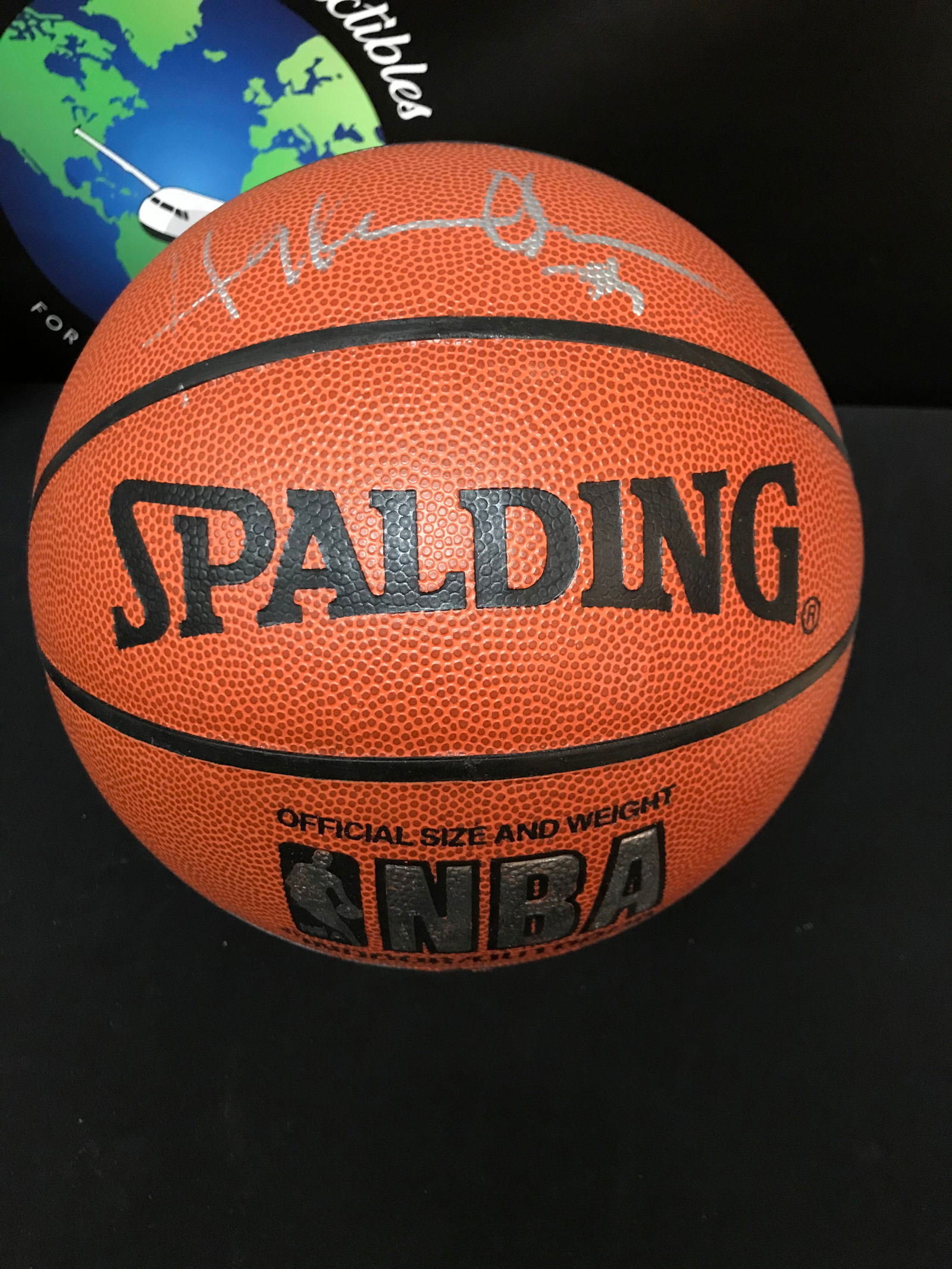 HAKEEM OLAJUWAN SIGNED BASKETBALL (JSA COA) (1 of 3)