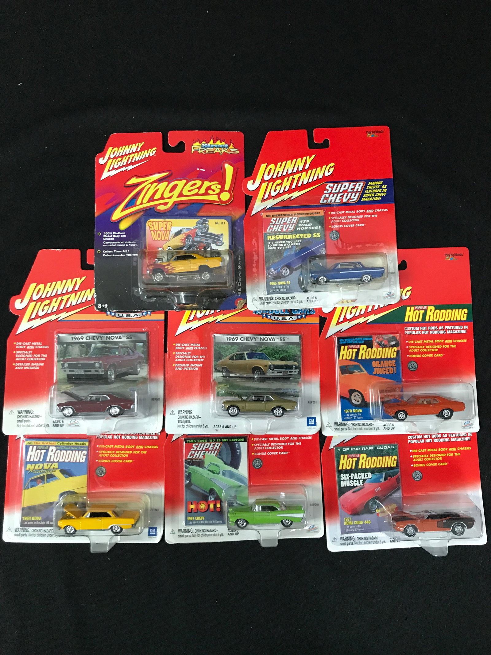 LOT OF 8 UNOPENED JOHNNY LIGHTENING CARS: Prices are in Canadian dollars