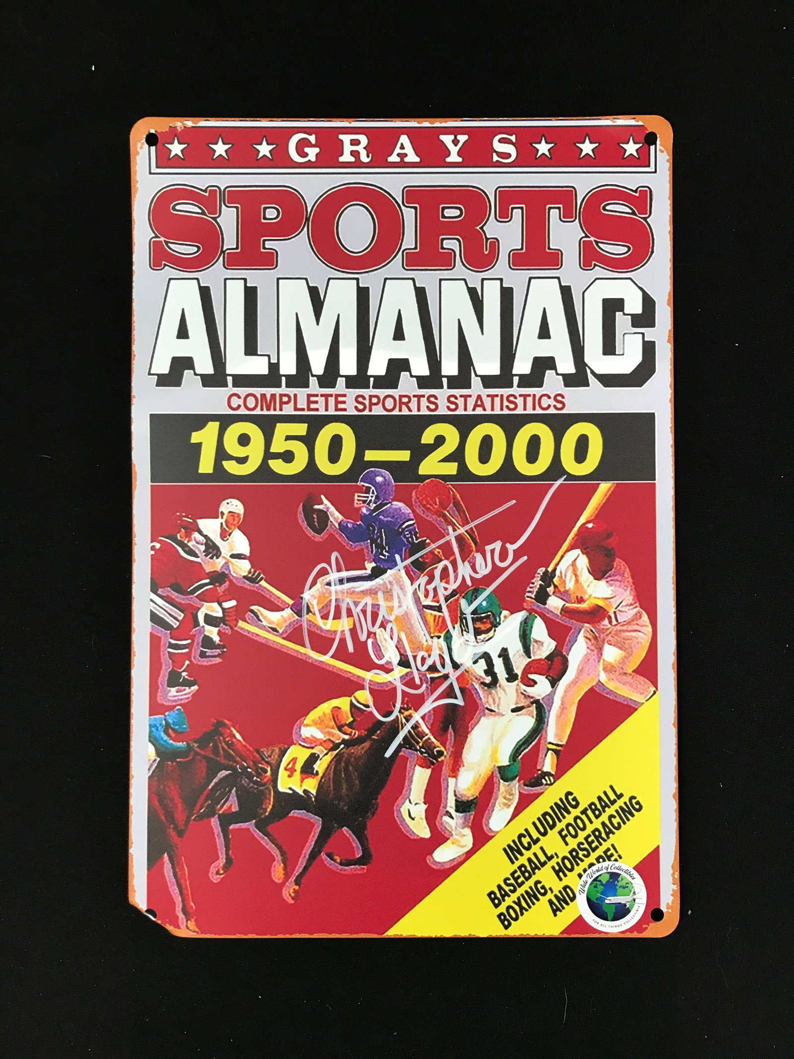 CHRISTOPHER LLOYD SIGNED SPORTS ALMANAC TIN SIGN (WWOC COA): Prices are in Canadian dollars