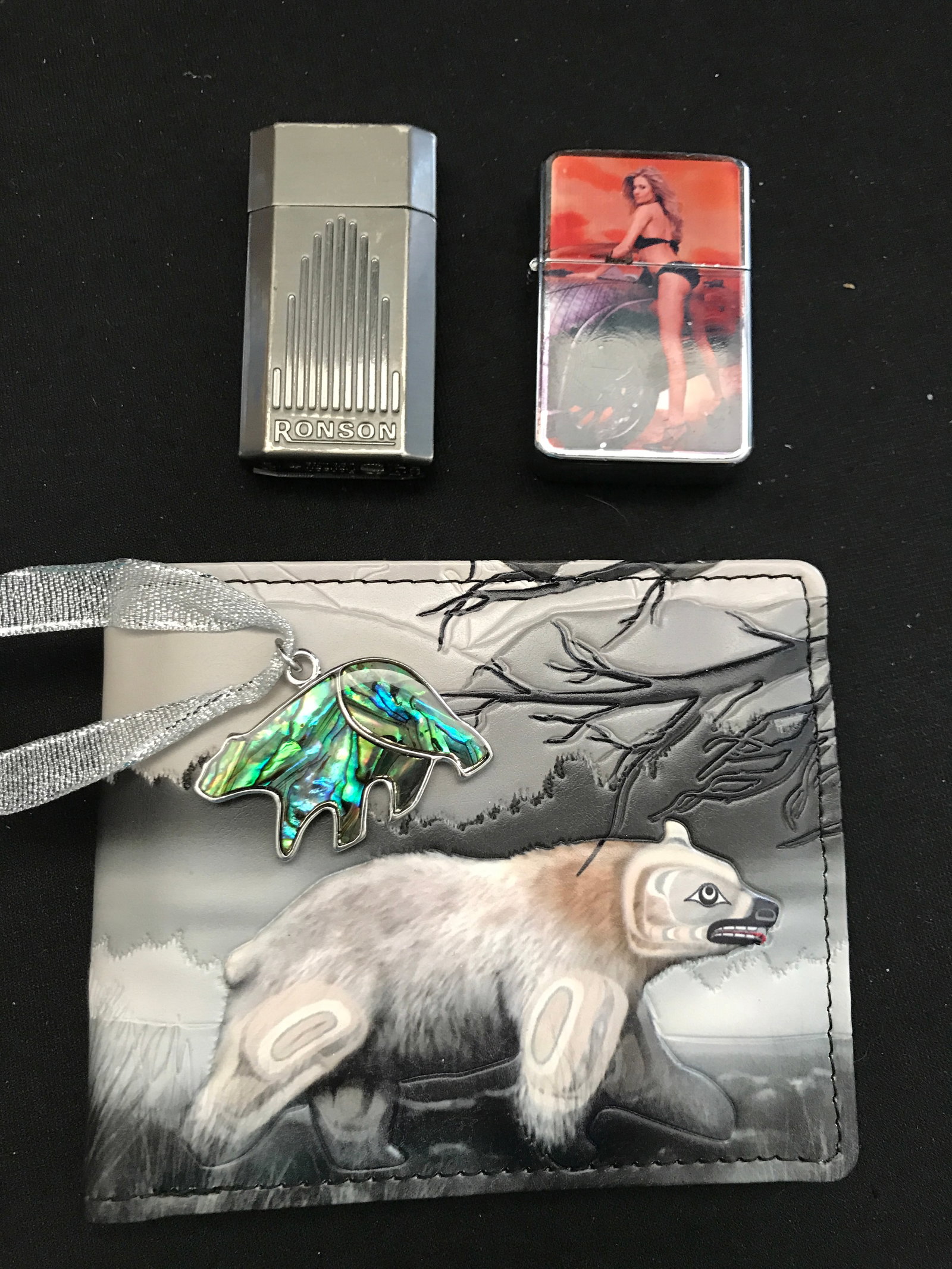 LOT OF 2 ZIPPO LIGHTERS AND A NATIVE LEATHERWALLET: Prices are in Canadian Dollars